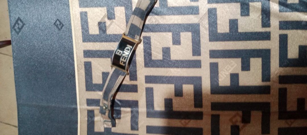 Fendi Umbrella (Category: Umbrellas) located in Makati City. Submitted by cd910625 (Listing ID 1417268473, Image 3). Description: - Authentic Fendi umbrella - Features iconic FF logo - Black handle and trim - Foldable design - Fendi logo visible - Includes matching strap.