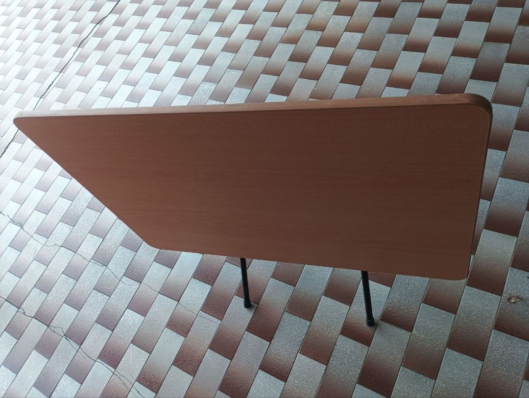Foldable Table (Category: Tables & Sets) located in Singapore. Submitted by hippidino (Listing ID 1417331689, Image 2). Description: Foldable table Light brown surface Black metal legs see vid: https://youtube.com/shorts/5QJvv5vlJxk?feature=share delivery +$5 start by texting your address. contactless delivery to your place shoe rack / cabinet / riser please send a picture of where to place the item..
