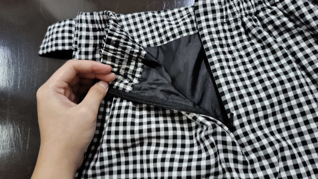 Gingham Wrap Skirt (Category: Skirts) located in Mandaue City. Submitted by isabeldecluttering (Listing ID 1417342876, Image 3). Description: Flattering wrap design with belt detail. zipper closure. Ruffled edge. Perfect for a casual chic office look -length: 17.5 inches -waist: 26 inches (stretchable) .