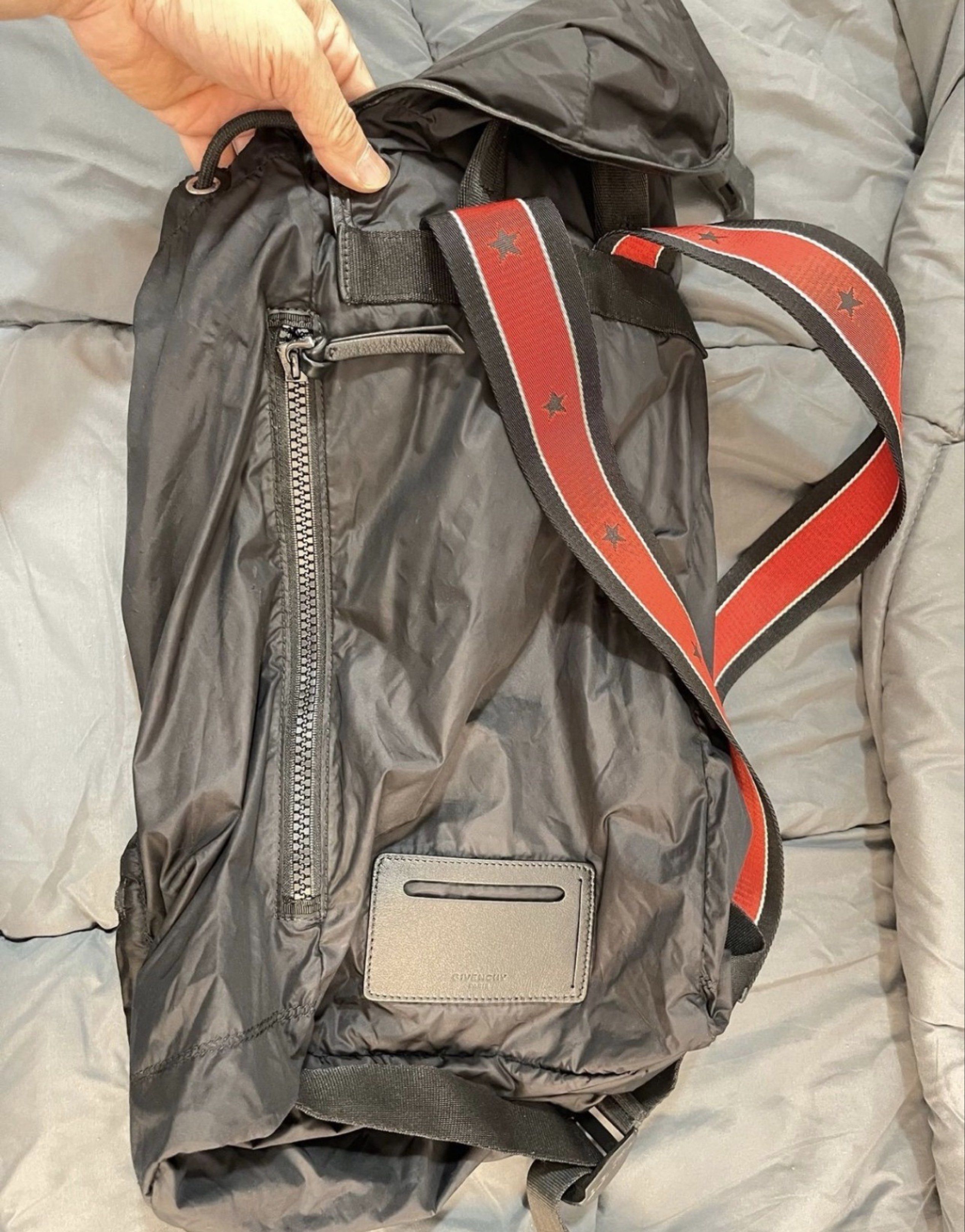 Givenchy Foldable Backpack (Category: Accessories) located in Kuala Lumpur. Submitted by legitseller_cheras (Listing ID 1417368729, Image 1). Description: Authentic Item in very good condition only flaw is drawstring tip is off and the rest all good. Refer last photo Practical bag, lightweight, trendy looking and foldable bag nice bag and lightweight.