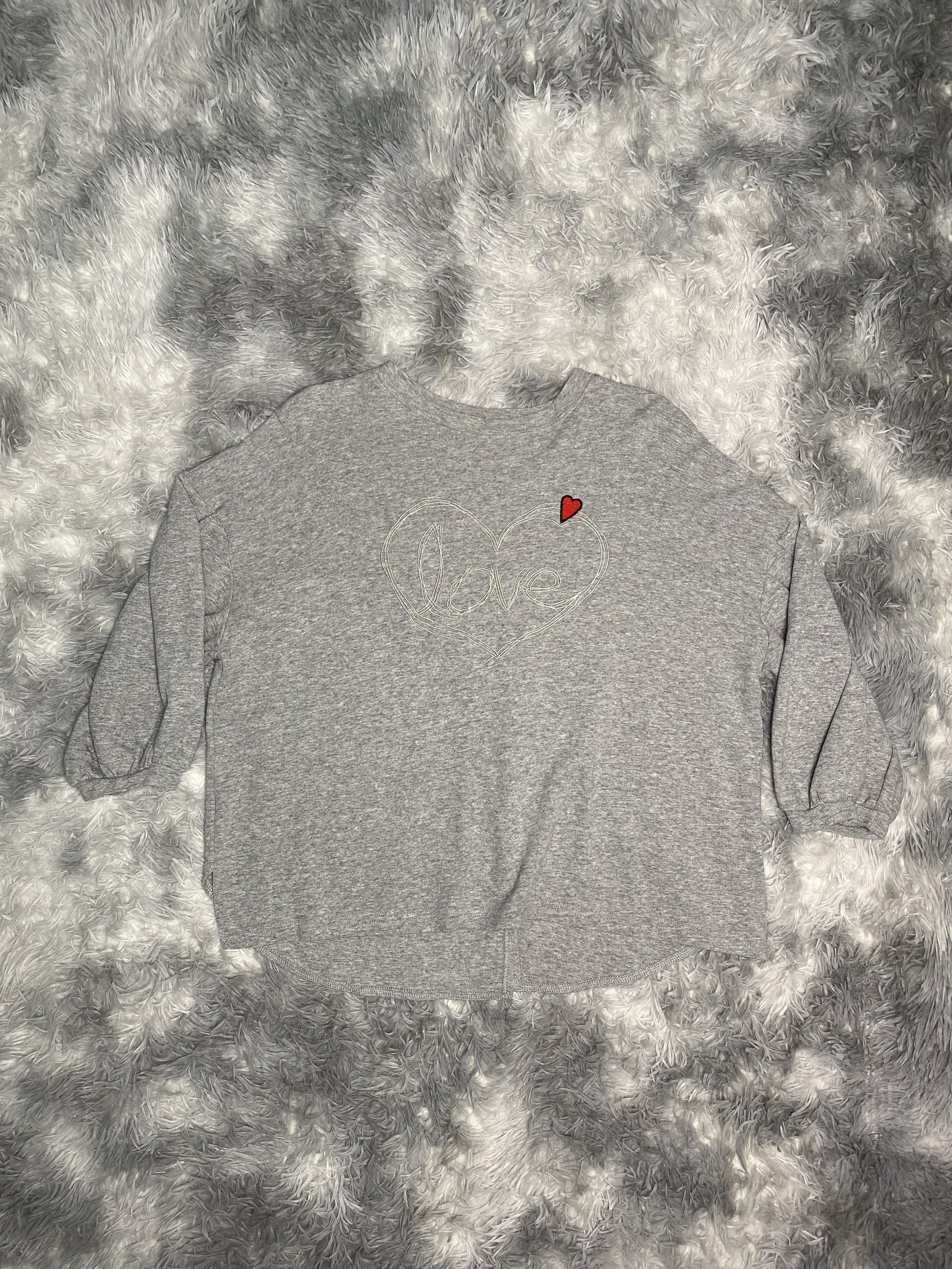 Grey Sweatshirt with Heart Detail (Category: Longsleeves) located in Manila. Submitted by dignthrift (Listing ID 1417246616, Image 2). Description: Brand: NONE Gray Women’s Crop Top SKU: 0090 Issue: None Condition: Excellent Coloration: 9/10 Size on Tag: None Width x Length: (see photos) + Shipping Fee 📌 Location: Las Piñas City, Metro Manila 📌 MOP: G CASH 📌 No Refund, No Return Ask for Details 📌 J&T Courier & LBC 📌 Due to lighting when the 