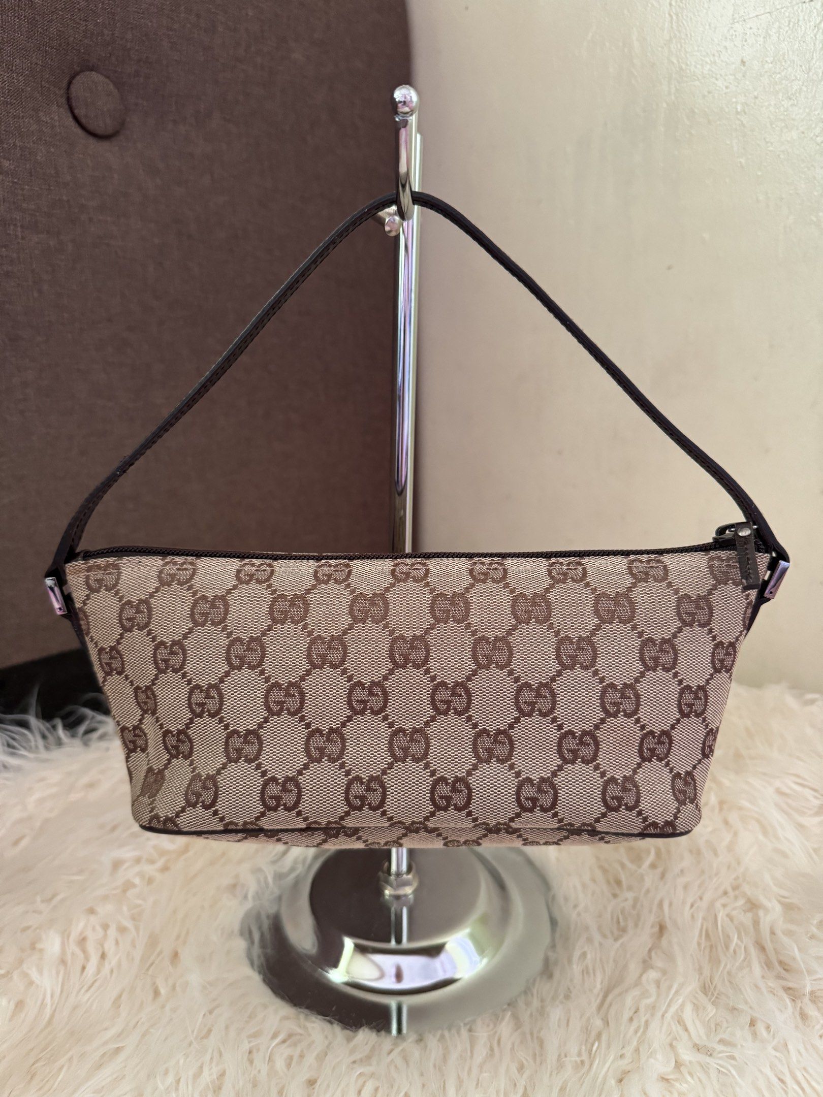 Gucci Boat Bag (Category: Luxury Bags & Wallets) located in Cavite. Submitted by japan_vintage_bags (Listing ID 1417222146, Image 2). Description: Authentic Gucci Boat Pochette Bag Japan Sourced No cracks, no glazing issue, no open piping Hardware still shiny, no fadings/tarnish Canvas is still clean no stains, no discoloration Clean interior, no foul smell In excellent condition Money back guarantee if proven fake Inclusions: Generic dustbag onl