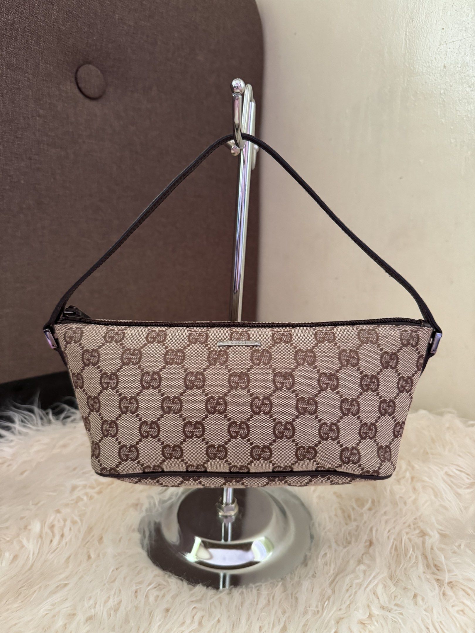 Gucci Boat Bag (Category: Luxury Bags & Wallets) located in Cavite. Submitted by japan_vintage_bags (Listing ID 1417222146, Image 1). Description: Authentic Gucci Boat Pochette Bag Japan Sourced No cracks, no glazing issue, no open piping Hardware still shiny, no fadings/tarnish Canvas is still clean no stains, no discoloration Clean interior, no foul smell In excellent condition Money back guarantee if proven fake Inclusions: Generic dustbag onl