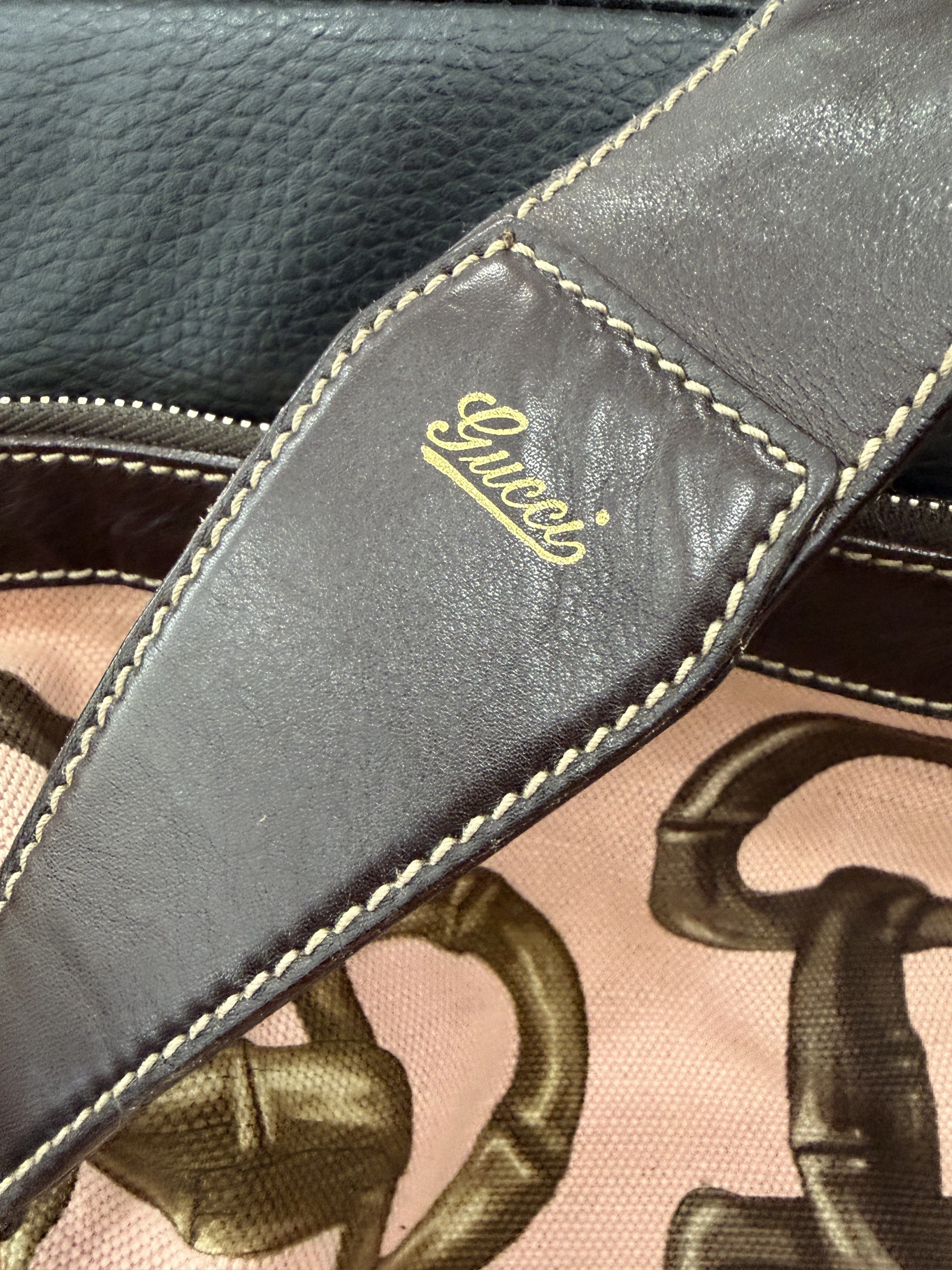 Gucci Pink Canvas Hobo Shoulder Bag (Category: Luxury Bags & Wallets) located in Vigan. Submitted by longliveolive (Listing ID 1417238747, Image 2). Description: - Gucci shoulder bag - Pink canvas exterior with equestrian bit pattern - Brown leather shoulder strap and trim - Zipper closure - Brown fabric interior lining - Serial number: 154401 205011.