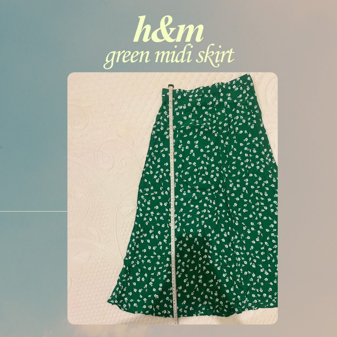 H&M Green Midi Skirt (Category: Skirts) located in Manila. Submitted by kkkkae_preloved (Listing ID 1417322876, Image 3). Description: ❗️BEST FITS xs to small frames ❗️ - Color: GREEN (may appear different due to lighting) - With floral pattern - With back zipper (see photos) - In good condition - NO holes / stains - Length measurement included (see photos).