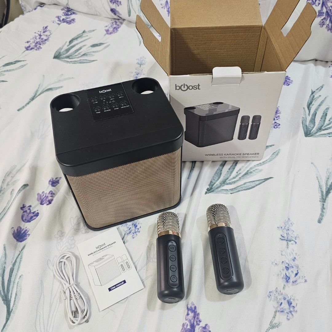 Gold Karaoke speaker with 2 wireless microphone (Category: Microphones) located in Quezon City. Submitted by maffy.ri (Listing ID 1417293444, Image 1). Description: Used once - No Issues ✅️ RFS: di nagagamit 📍Location: Crame, malapit sa Cubao 💵 MODE OF PAYMENT: - Gcash or Bank 🚙 Delivery: - Via Lalamove, shipping will be shouldered by buyer ✅️ I'll be sending videos and pictures during the transaction for assurance .