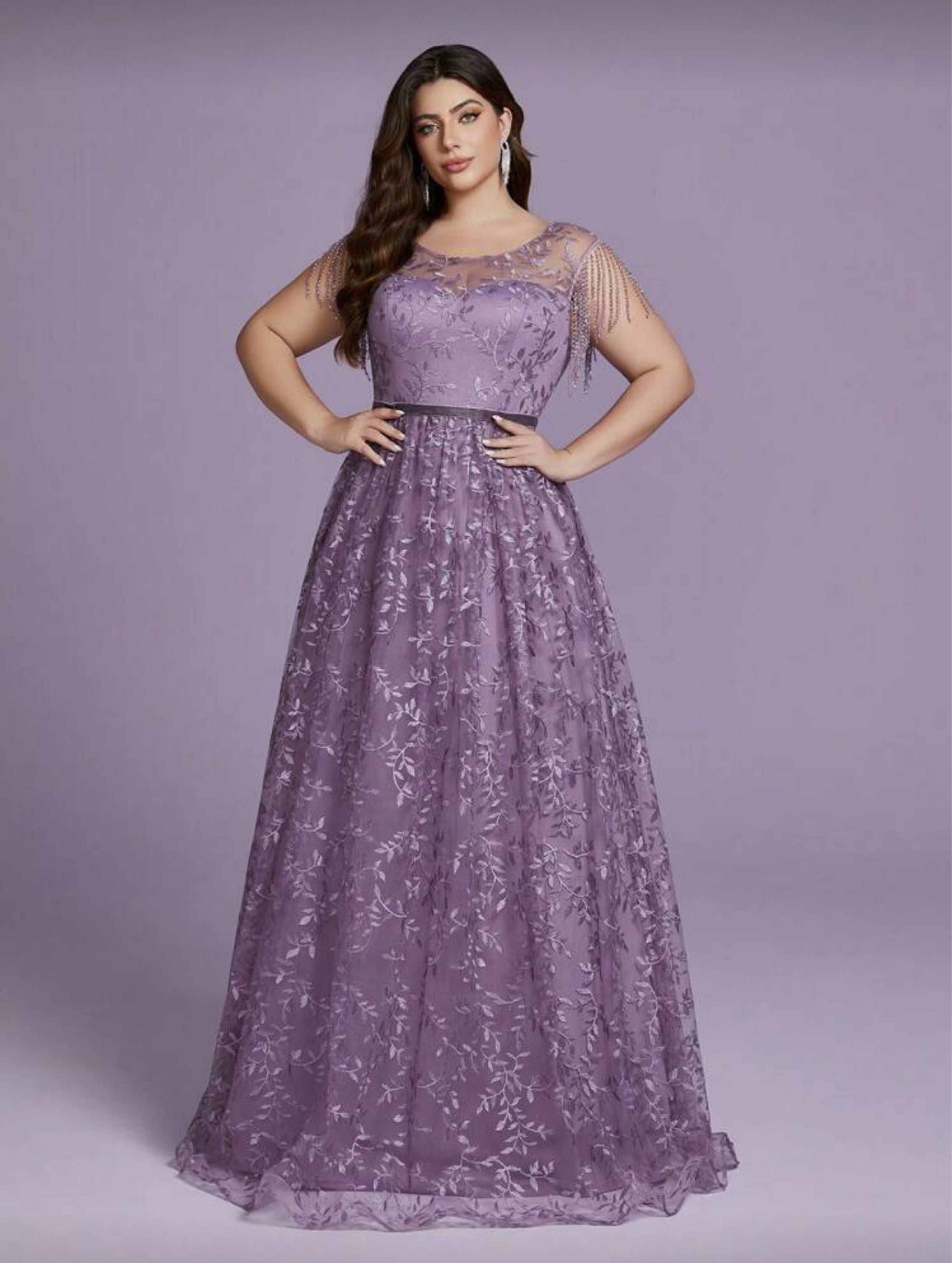 Lavender Embellished Evening Gown (Category: Evening dresses & gowns) located in Taguig. Submitted by wountersdam (Listing ID 1417318824, Image 3). Description: Elegant lavender evening gown with intricate leaf embroidery. Features a round neckline with beaded fringe detailing on the shoulders. Includes a matching velvet belt that cinches the waist. The dress has a flowing, floor-length skirt. Perfect for formal events and special occasions. - Bo
