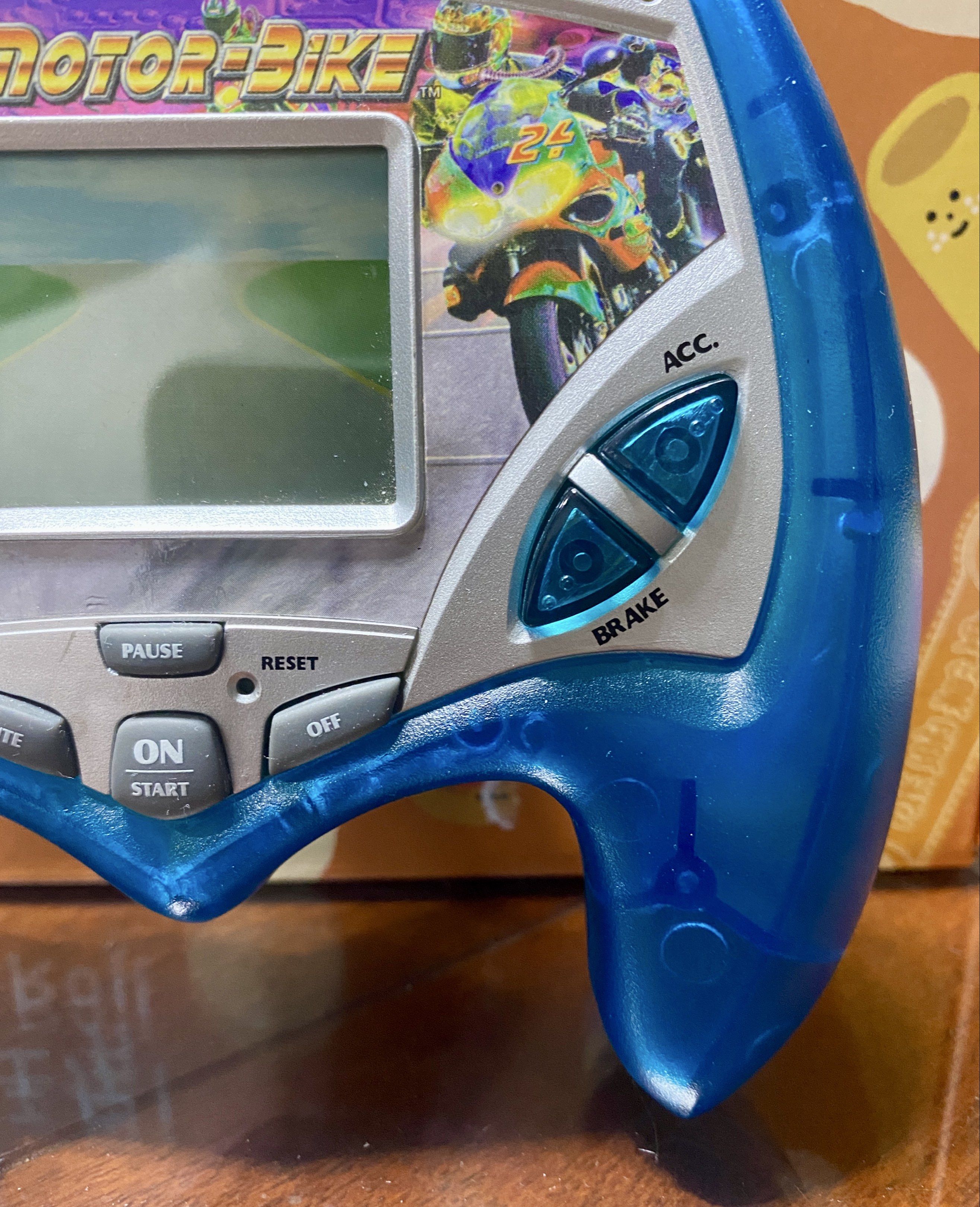 Like New Motor Bike Handheld Game Console (Category: Nintendo) located in Quezon City. Submitted by inmycloset03 (Listing ID 1417381641, Image 3). Description: - Like New Motor Bike Handheld Game Console - Features a retro design with blue accents. - Perfect for collectors or casual gamers. - A fun toy for all ages..