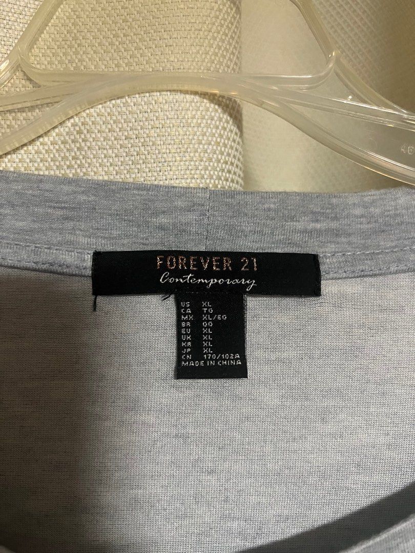 Long Sleeved Shirt (Category: Longsleeves) located in Makati City. Submitted by helpmedeclutter03 (Listing ID 1417251488, Image 2). Description: - Used but no damage - Material is thin and soft - Color same as picture (pale bluish gray) .