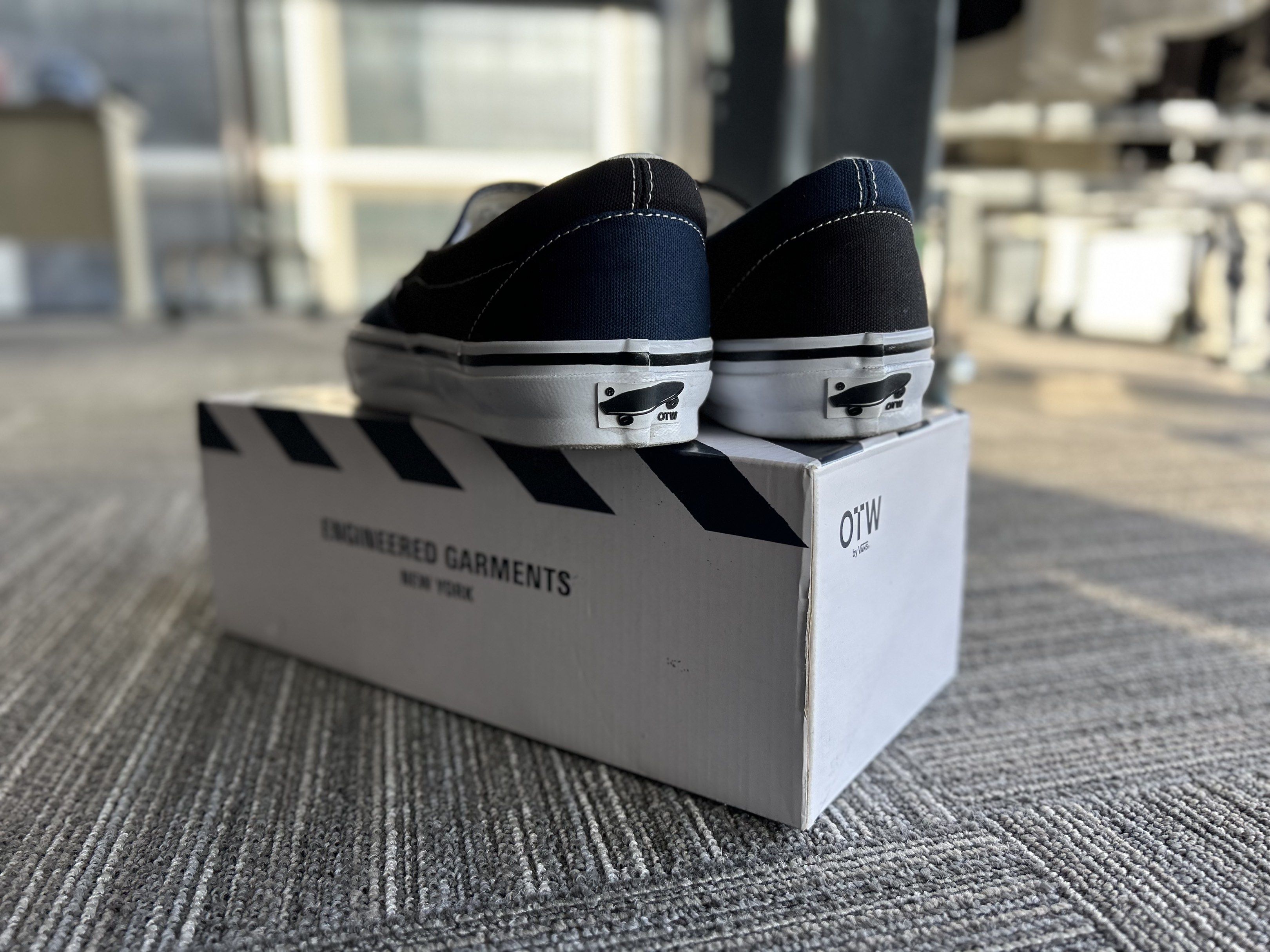 OTWbyVans x Engineered Garments (Category: Sneakers) located in Manila. Submitted by bodegabodega (Listing ID 1417388094, Image 3). Description: - Vans x Engineered Garments collaboration - Slip-on style sneakers - Color: Navy and Black - Includes original box - White midsole - Engineered Garments logo on insole - Engineered Garments logo on box WTS OTWByVans x Engineered Garments NY Used once Complete With Box and Receipt Good as new Size 11 Bou