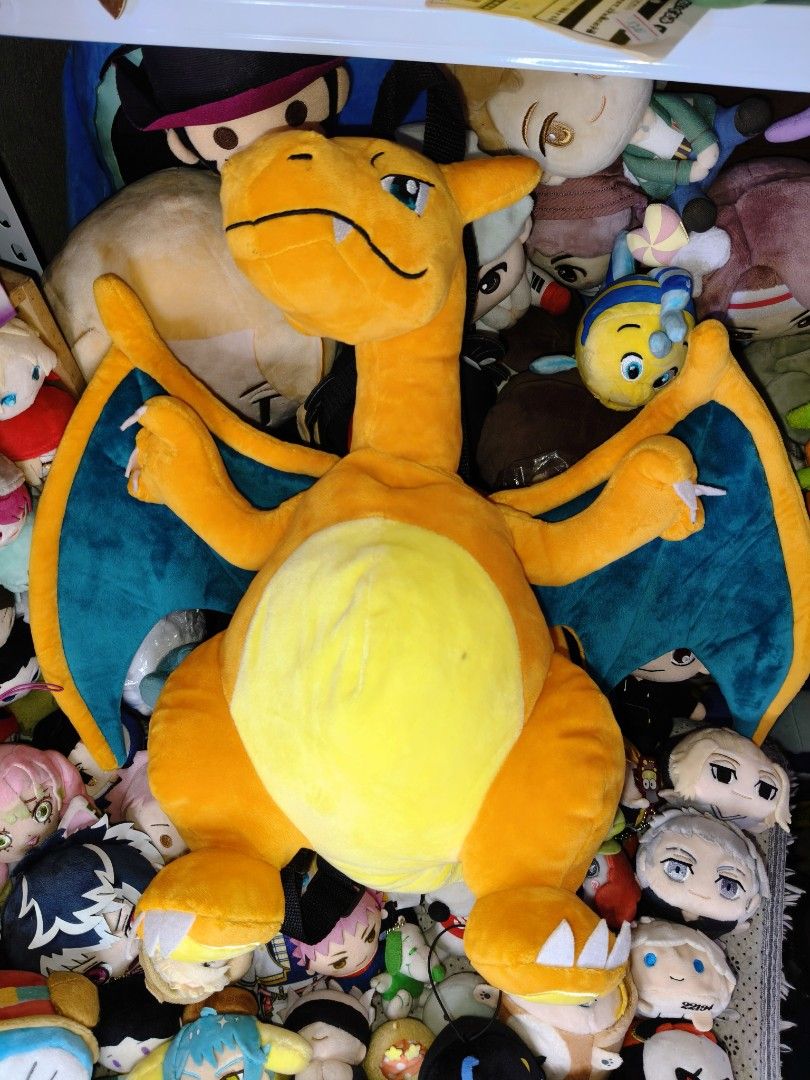 Pokemon Charizard Plush Backpack (missing ppt) (Category: Backpacks) located in Manila. Submitted by neroneko-pb126 (Listing ID 1417243389, Image 1). Description: - Charizard plush backpack - Vibrant orange and blue color scheme - Features Charizard design with wings and tail - Adjustable straps - Zipper closure - Licensed Pokemon product.