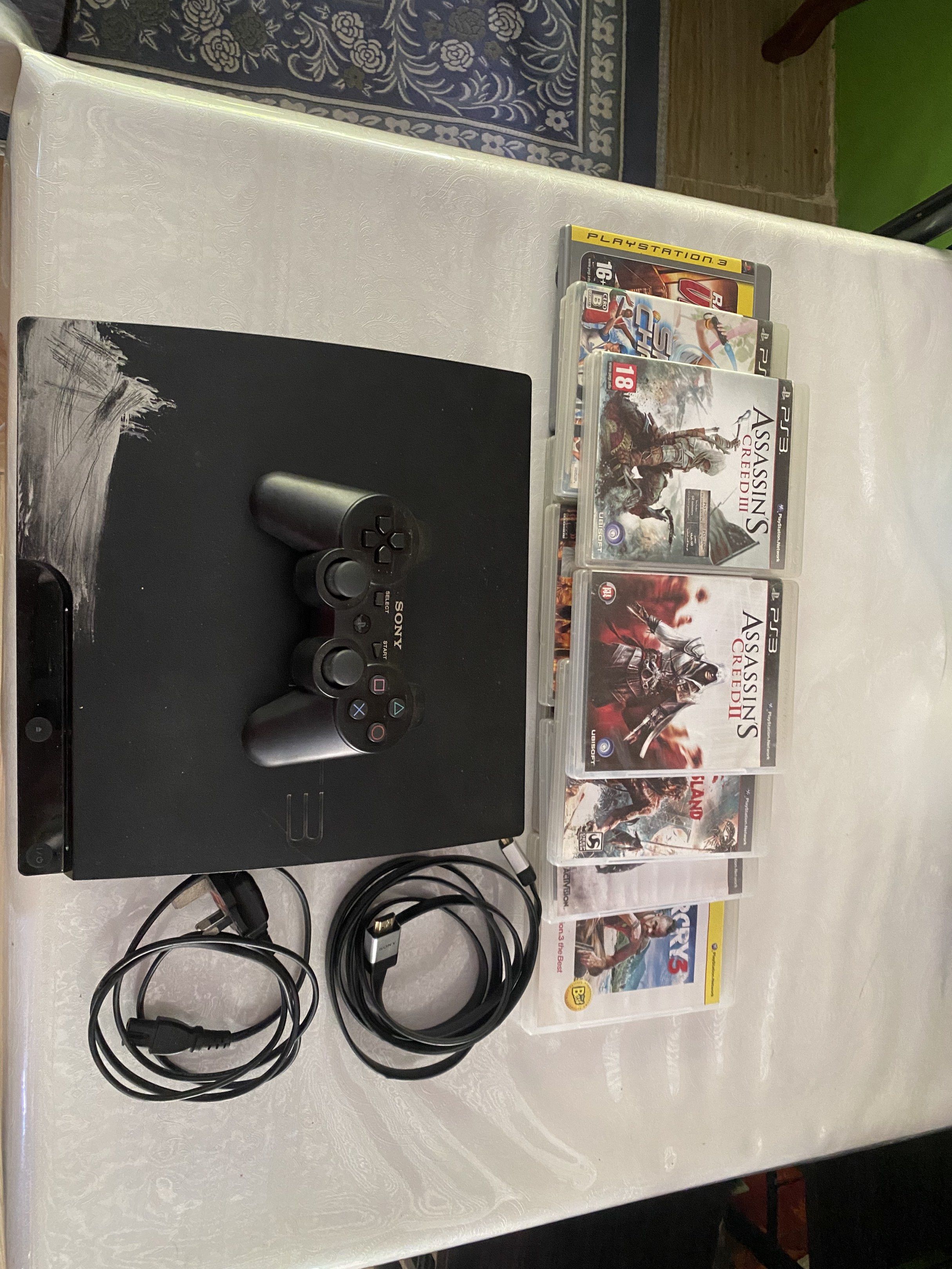 PS3 SLIM FOR SALE READ DESCRIPTION (Category: PlayStation) located in Manila. Submitted by javes_ (Listing ID 1417348266, Image 2). Description: Ps3 for sale with games (call of duty mw3, assassins creed 2&3,far cry 3,devil may cry 4,tom clancy rainbow six) included controller hdmi and power adapter PRICE NEGOTIATIOABLE PAYMENT: Gcash Cash (if near or meet up) Note: there are no damage or defects to the console or games just the paint at the fron