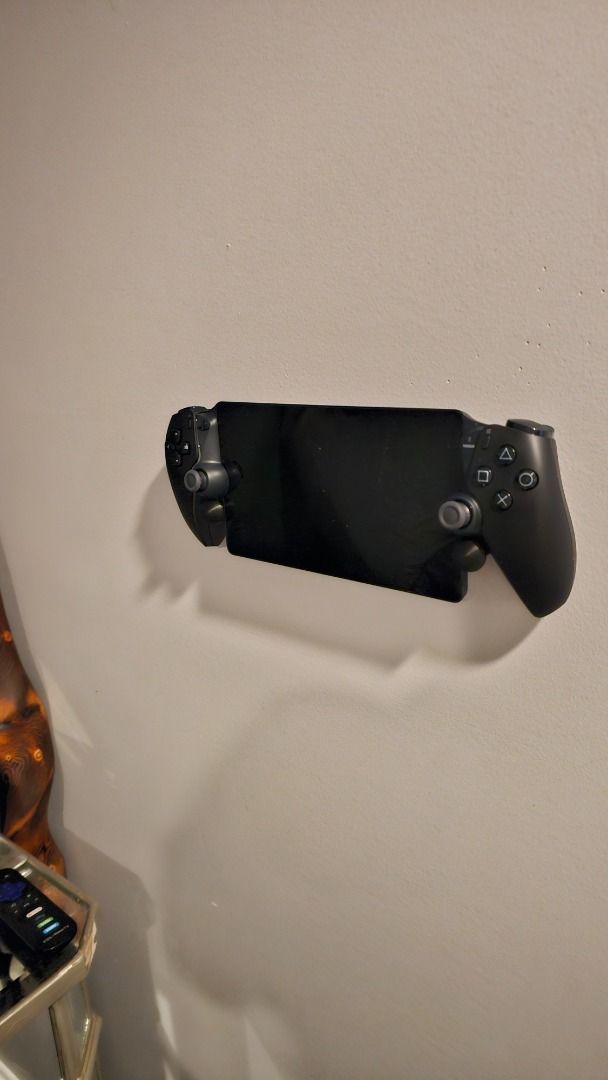 PS Portal Wall Mount | Secure Holder Bracket | Space‑Saving & Easy Install (Category: PlayStation) located in Mandaluyong City. Submitted by heyitslaaaance (Listing ID 1417218454, Image 1). Description: Keep your PlayStation Portal safe, accessible, and beautifully displayed! This PS Portal Wall Mount is designed to securely hold your device while giving your setup a clean and modern look. ✔️ Features Perfect Fit for PS Portal – Holds your device