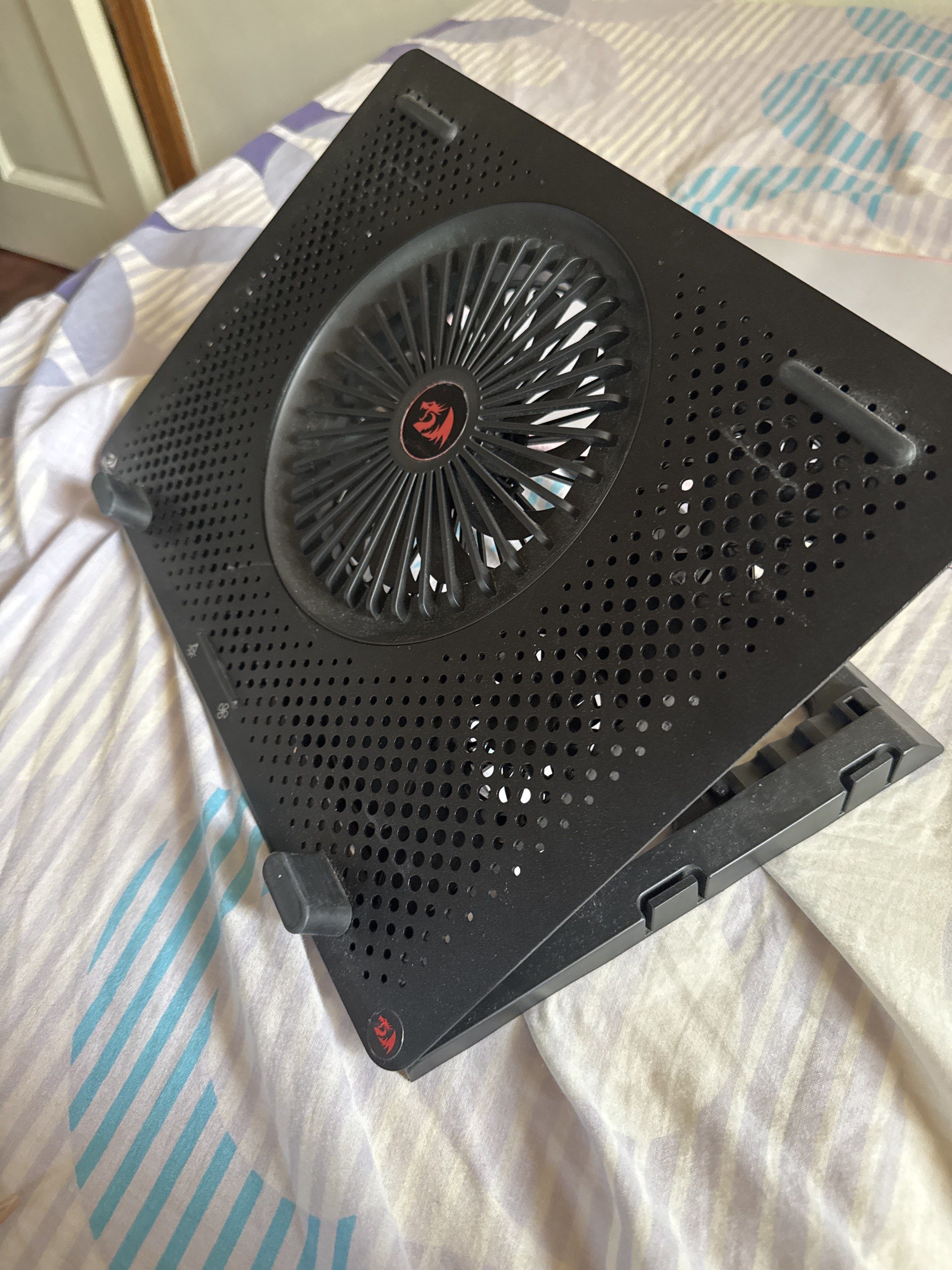 Redragon Laptop Cooler (Category: Laptops & Notebooks) located in Bacoor. Submitted by blueberrycheesecake11 (Listing ID 1417231477, Image 3). Description: Redragon laptop cooler features a large fan for efficient cooling. It has an adjustable stand for comfortable viewing angles. The cooler includes a USB cable for power + Mouse Pad for FREE!! Wala na pong Box! but I can pack it with a box and bubble wrap.