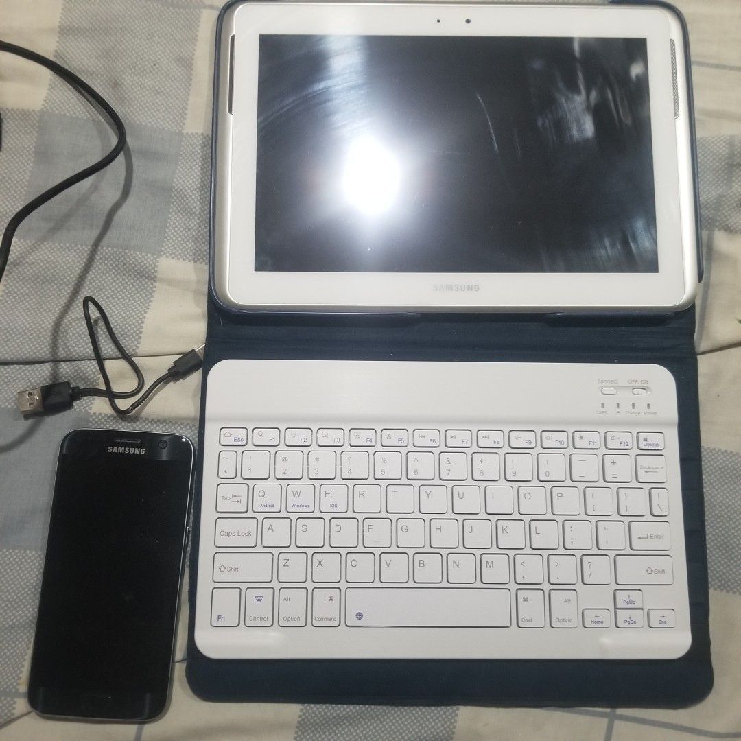Samsung tablet 10.1 with coverstand, bluetooth (Category: Android) located in Paranaque City. Submitted by showboat (Listing ID 1417399942, Image 1). Description: complete bundle set with cover stand, bluetooth keyboard with micro SD.