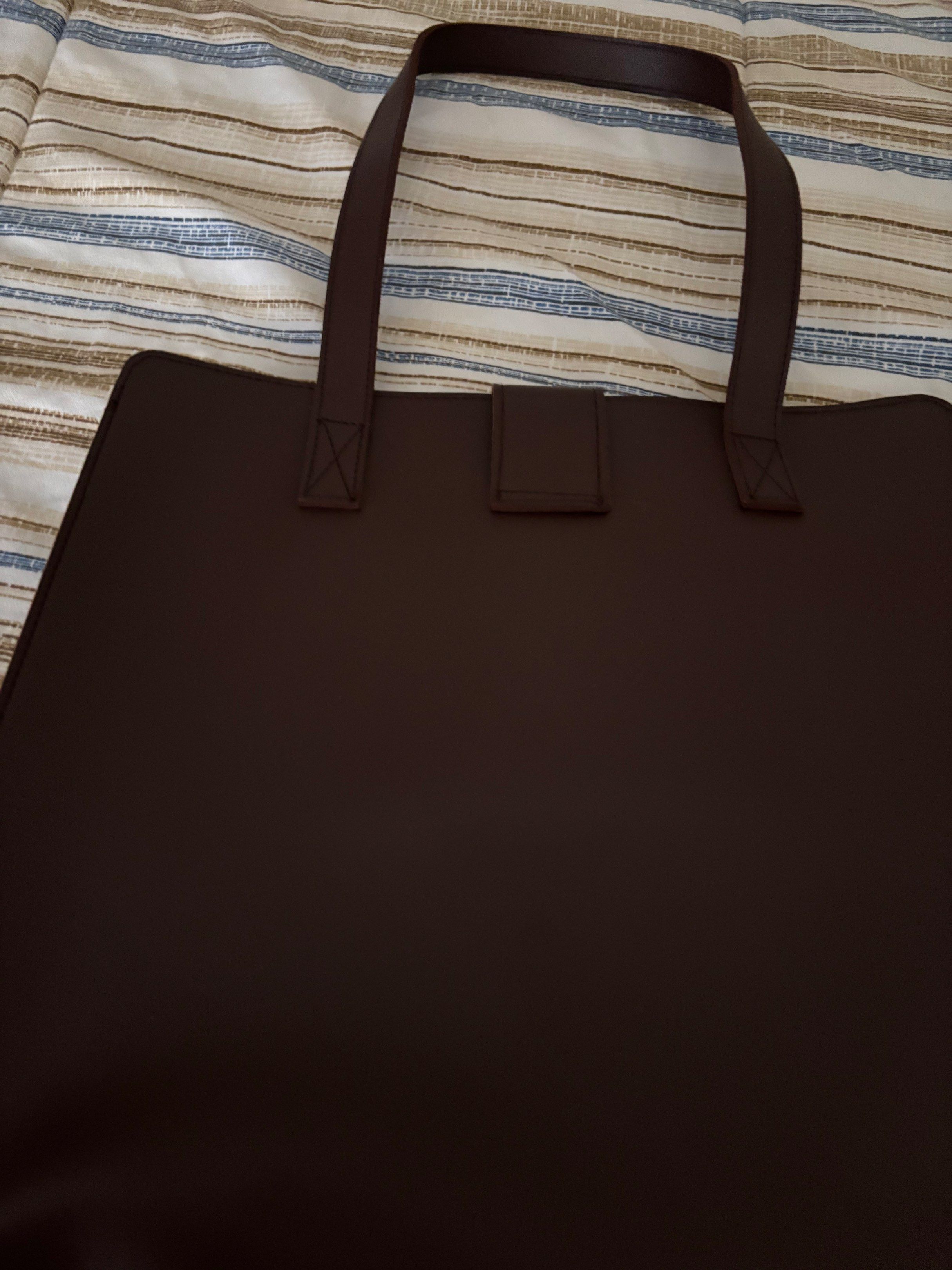Straightforward Tote Bag (Category: Tote Bags) located in Las Pinas. Submitted by olivem (Listing ID 1417335434, Image 1). Description: Stylish tote bag from Straightforward. Features a magnetic closure and sturdy handles. Available in brown and beige. The bag has a simple, minimalist design, perfect for everyday use (can fit a 15-inch laptop) The Straightforward logo is visible on the front..