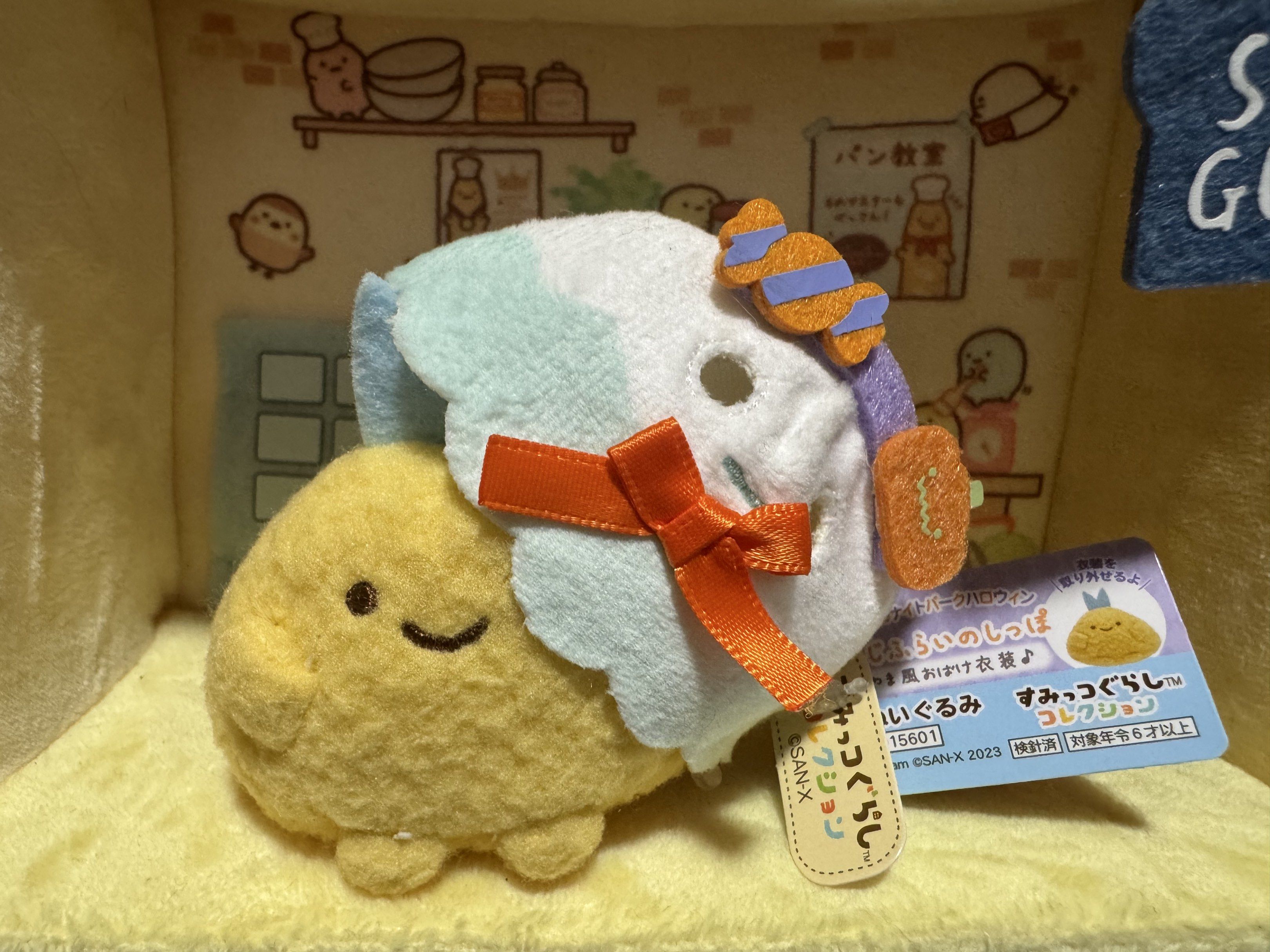 Sumikko Gurashi Aji Halloween Plush (Category: Plushies & Soft Toys) located in Caloocan City. Submitted by heeynahsbliss (Listing ID 1417272102, Image 2). Description: - Sumikko Gurashi Halloween plush - Features a character in a ghost costume - Includes pumpkin and candy accents - Comes with original tag - Collectible item.