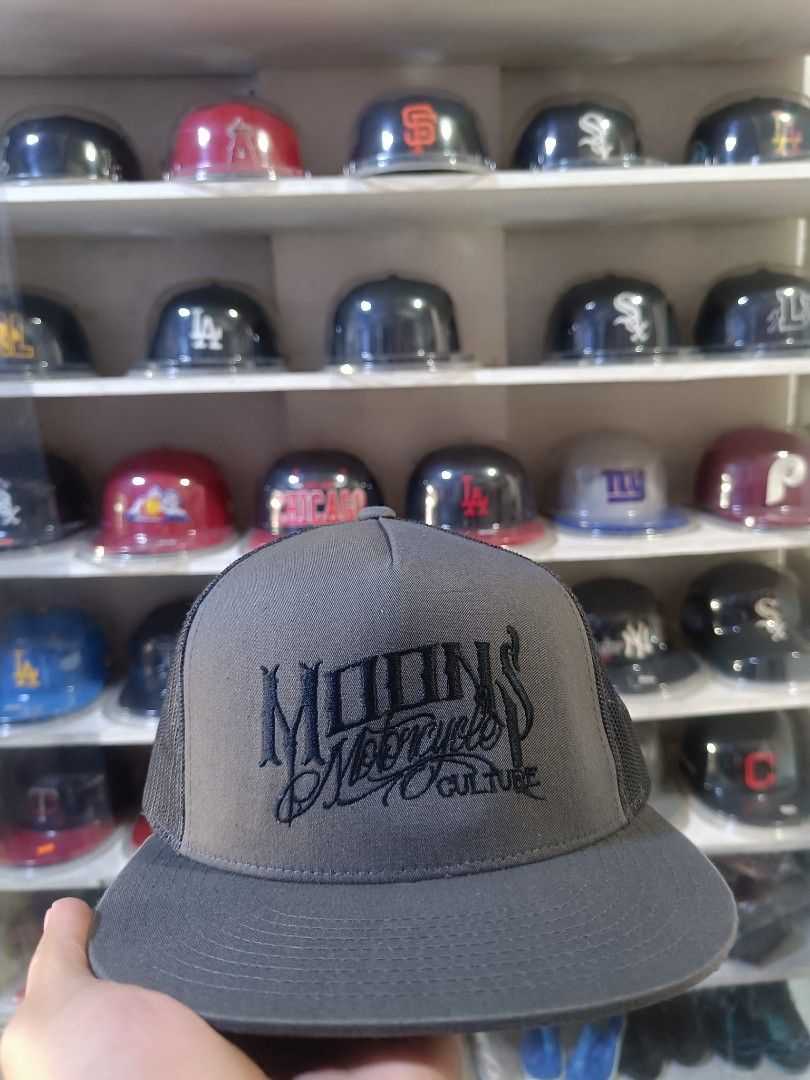 The Classics Moon's Motorcycle Culture Cap (Category: Caps & Hats) located in Manila. Submitted by kramhats (Listing ID 1417256997, Image 1). Description: - Moon's Motorcycle Culture logo - Made with 65% polyester and 35% cotton - Mesh back design - Flat brim - Manufactured in Vietnam - Brand: The Classics by Yupoong.