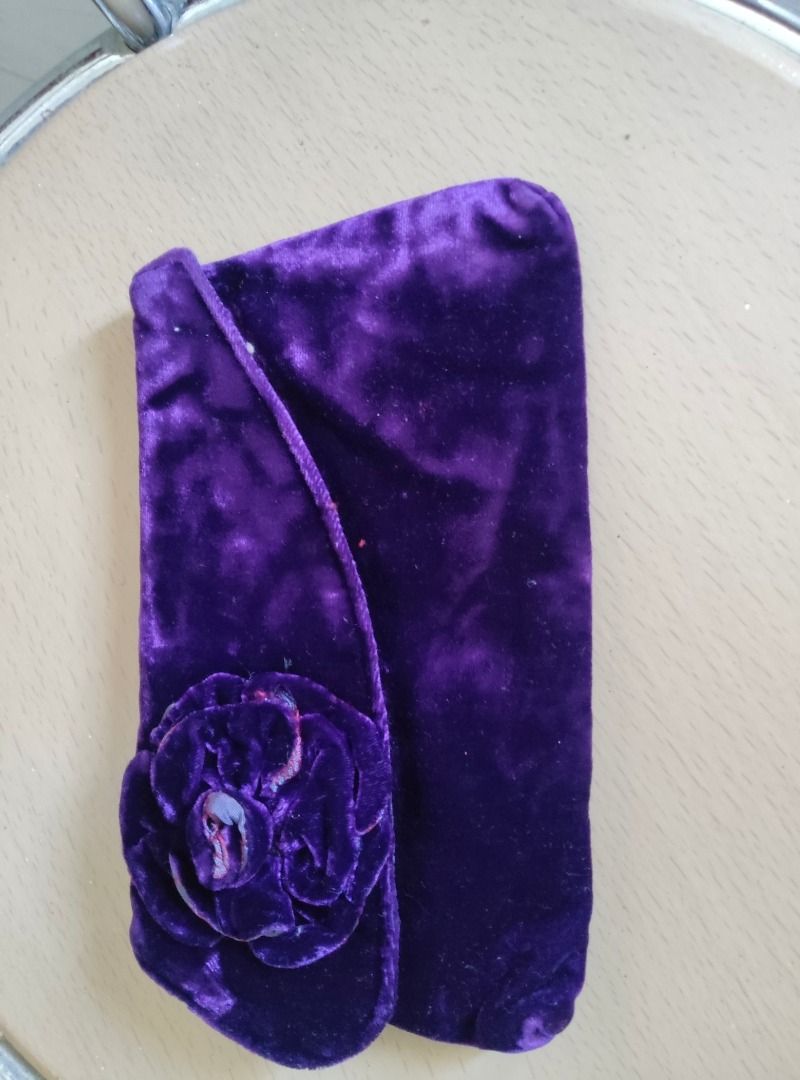 Torba Purple Velvet Clutch (Category: Clutches) located in Angeles City. Submitted by jeancoco (Listing ID 1417273483, Image 1). Description: - Brand: Torba - Color: Purple - Material: Velvet - Features: Decorative flower, patterned interior lining, zipper closure - Style: Clutch - Perfect for special occasions.