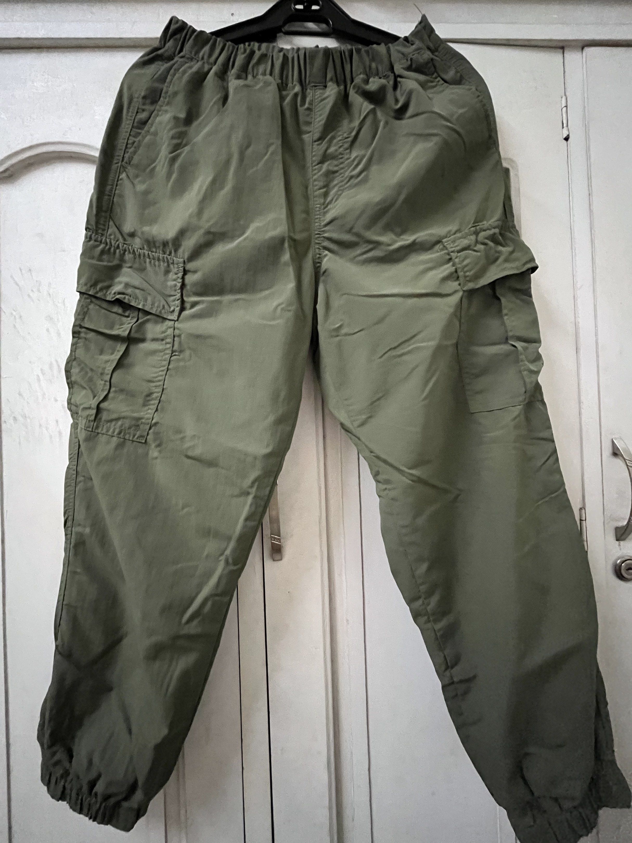 Uniqlo Cargo Pants - Size 140 (Category: Babies & Kids Fashion) located in Marikina City. Submitted by hello-yellow (Listing ID 1417348841, Image 1). Description: - Uniqlo olive green cargo pants - Size: 140 on tag. Actual waist 22-30 inches, gartered and adjustable waist. - Length 32 inches. - Color: Olive Green - Features multiple pockets - Elastic waistband - Relaxed fit - Elastic ankles - Lightweight material - Suitable for casual wear For 8-