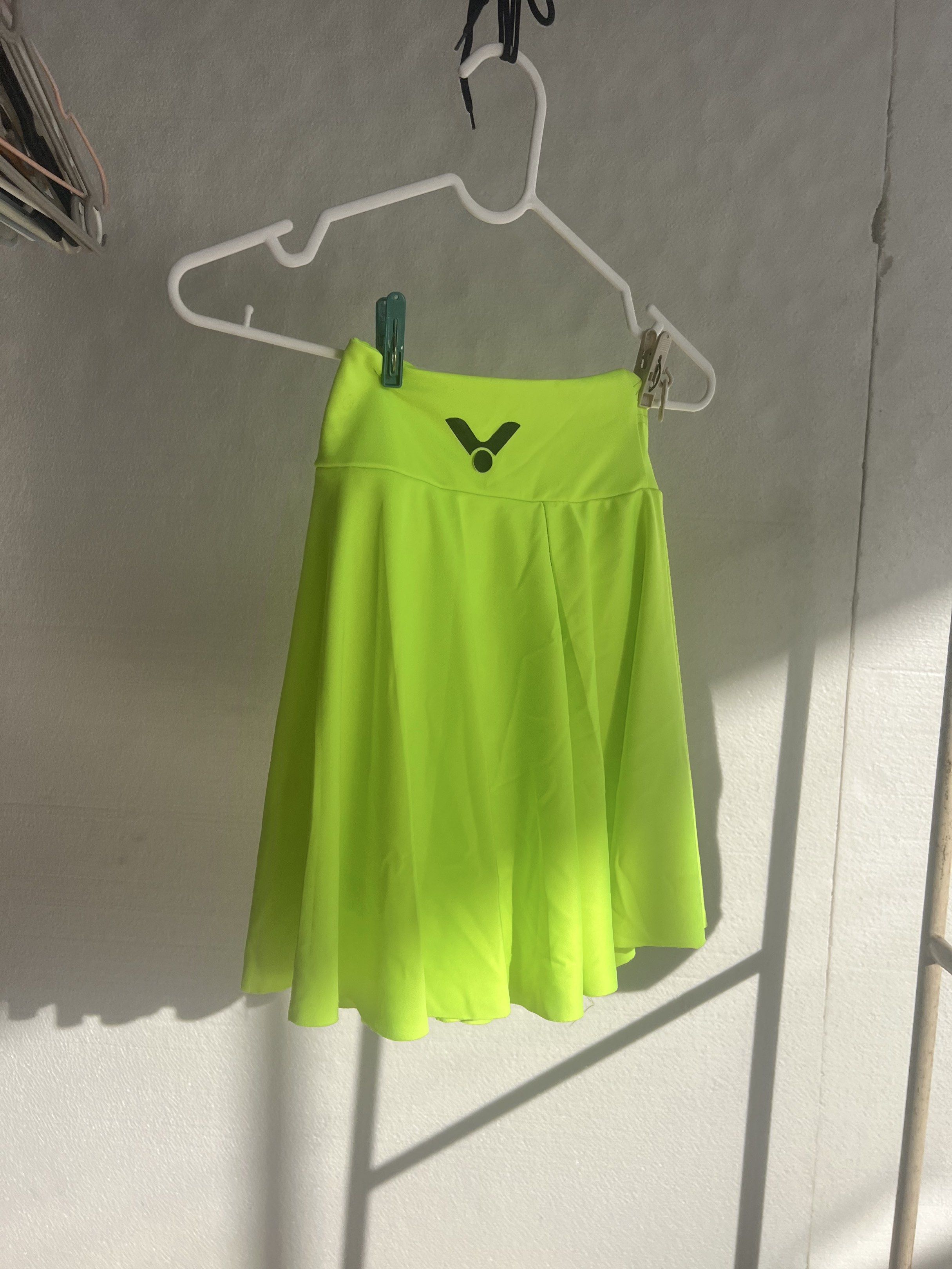 Victor Neon Green Skirt (Category: Skirts) located in Paranaque City. Submitted by gummychoo (Listing ID 1417296014, Image 3). Description: - Neon green Victor skirt - Wide waistband - Flared design - Lightweight, athletic fabric - Suitable for sports and casual wear.