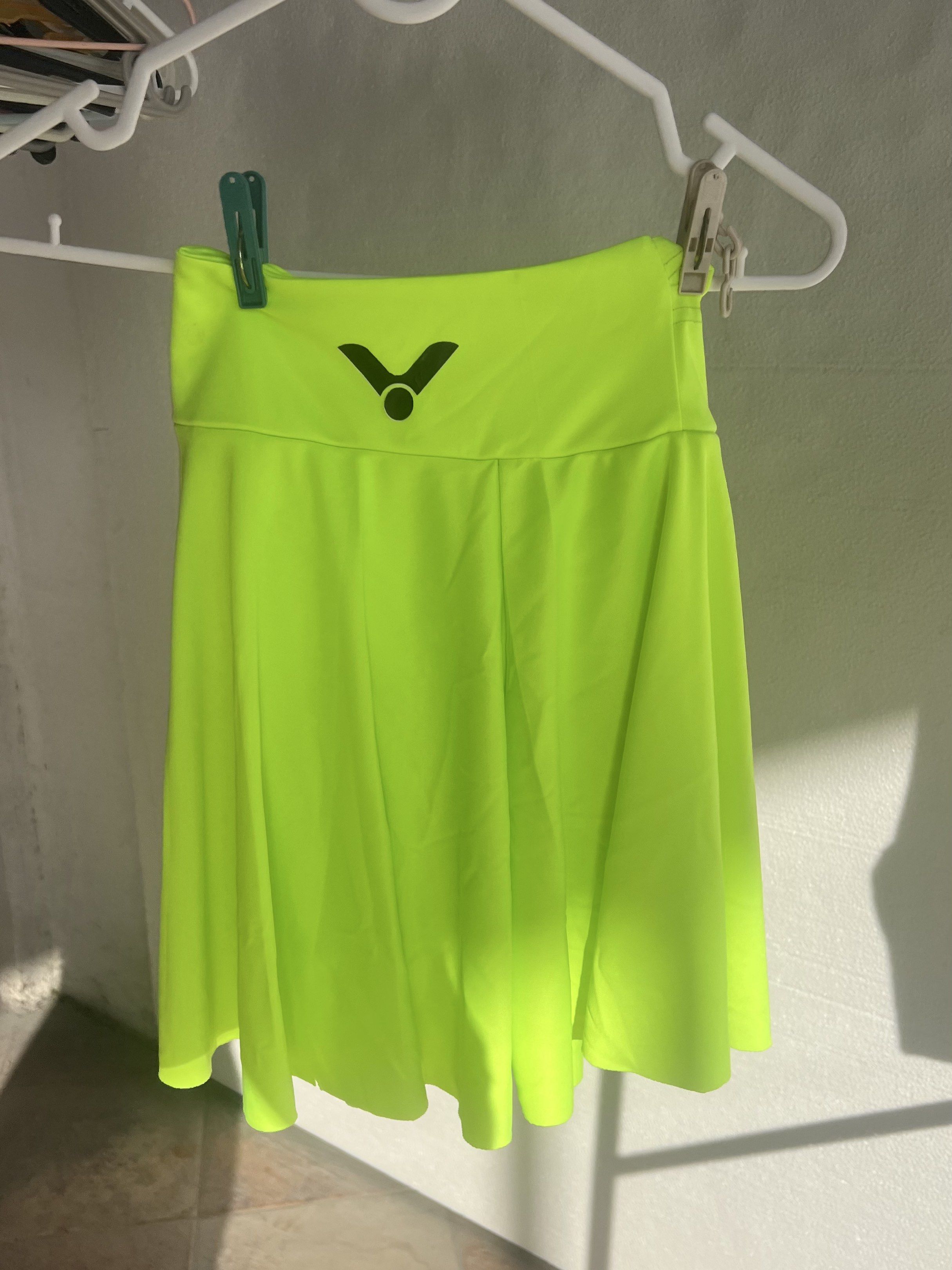 Victor Neon Green Skirt (Category: Skirts) located in Paranaque City. Submitted by gummychoo (Listing ID 1417296014, Image 1). Description: - Neon green Victor skirt - Wide waistband - Flared design - Lightweight, athletic fabric - Suitable for sports and casual wear.
