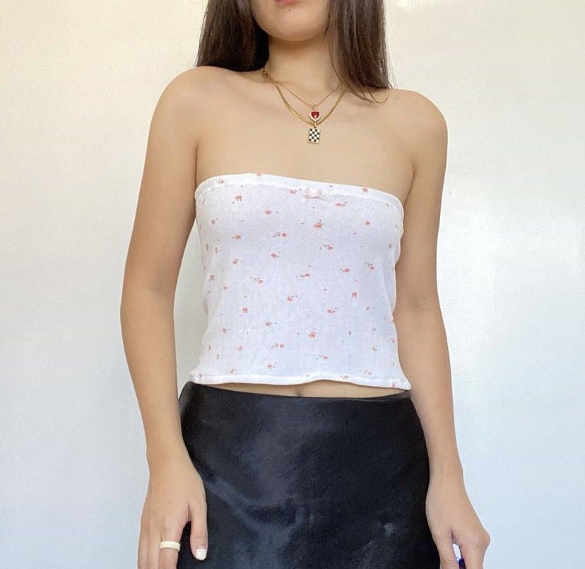 White Floral Tube Top (Category: Others Tops) located in Quezon City. Submitted by danalou (Listing ID 1417335814, Image 1). Description: - size small-medium - L10", bust up to 34" - reworked from a kid's short - with small pink bow details.