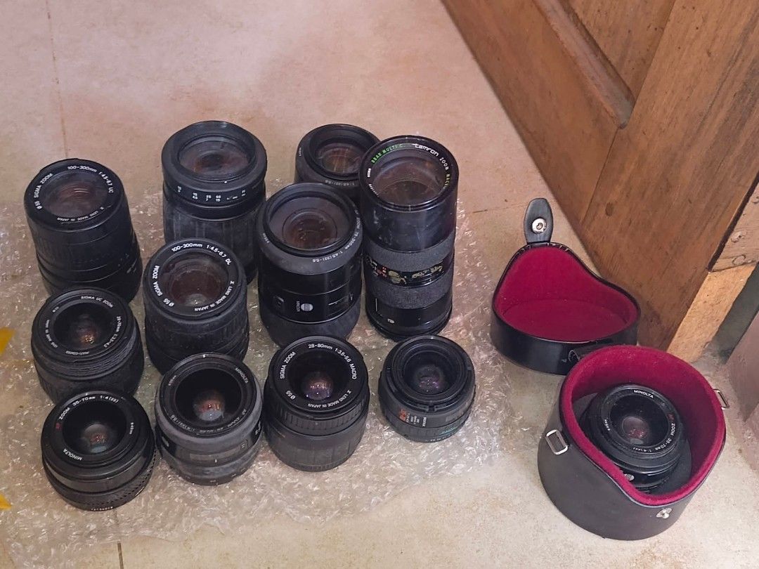 Assorted Camera Lenses - Sigma, Tamron, Minolta (Category: Cameras) located in Baguio. Submitted by ninav_08 (Listing ID 1417599169, Image 1). Description: - Collection of camera lenses (Sigma, Tamron, Minolta). - Includes zoom and prime lenses. - Various sizes and focal lengths available. - Some lenses come with cases. - All lenses are black. TAKE ALL TAKE ALL BUY AS IS..diko matry wala akong Camera..nakuha lang sa box shipping payment first via