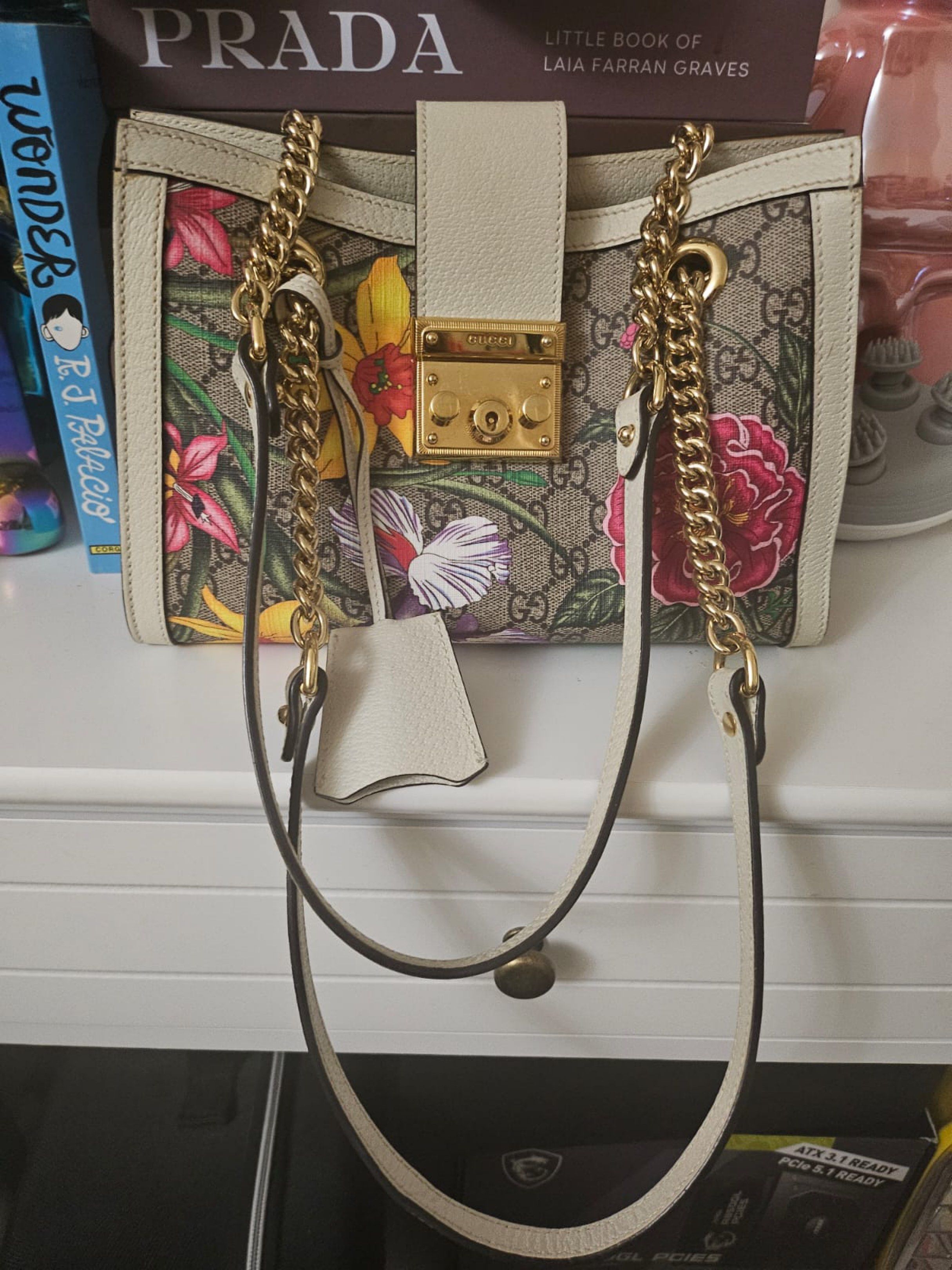 Authentic Gucci Padlock Small Beige/Off White Flora GG Supreme Canvas Tote (Category: Luxury Bags & Wallets) located in Rizal. Submitted by SummerPeaCloset (Listing ID 1417411368, Image 1). Description: Authentic Gucci Padlock Small Beige/Off White Flora GG Supreme Canvas Tote With dustbag and entrupy certificate With minor scratches on the hardware Selling low Retail at 128,000.
