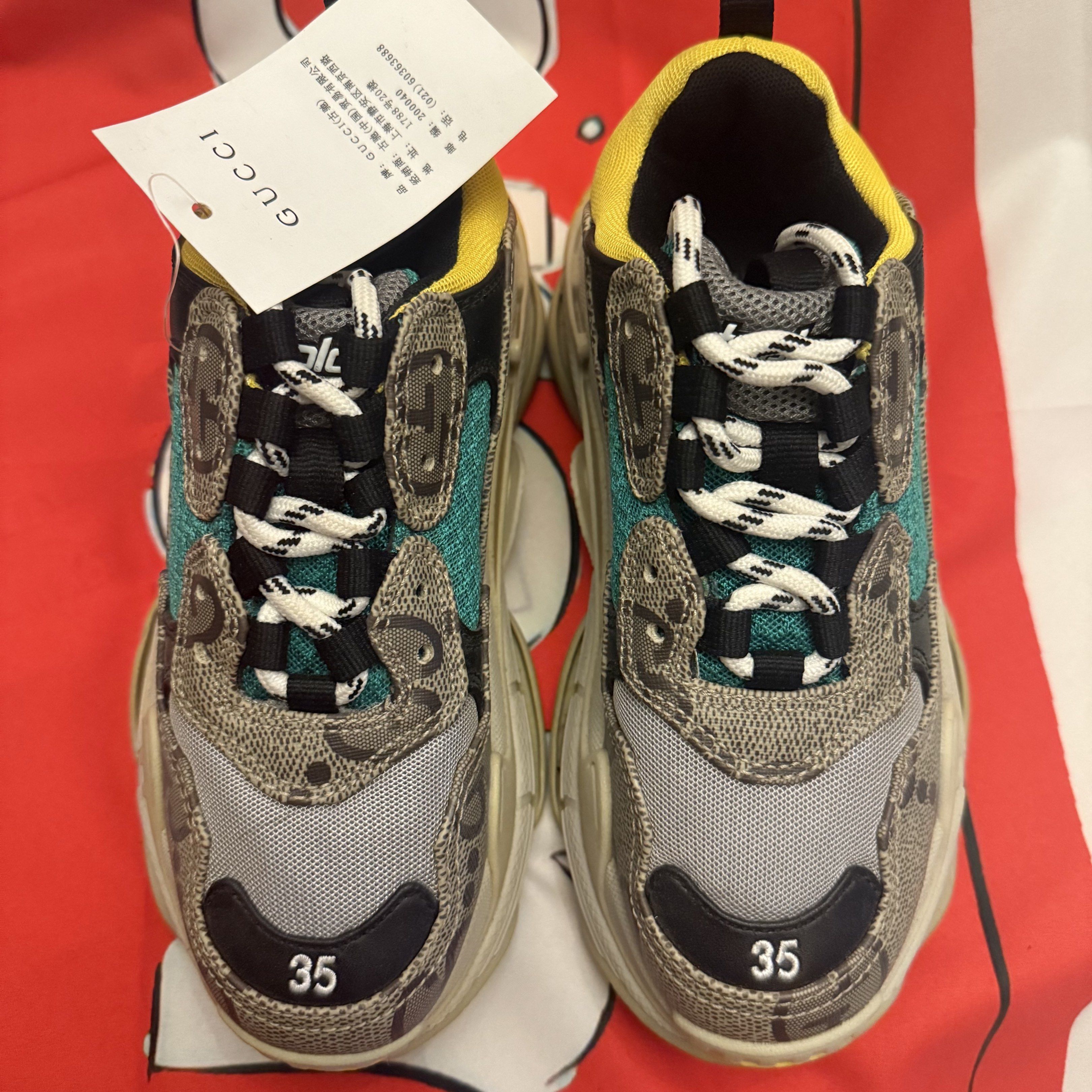 BB x GG Hacker Project Triple S Sneakers Size 35 (Category: Sneakers & Footwear) located in Paranaque City. Submitted by toastedmallows (Listing ID 1417589534, Image 2). Description: - Balenciaga Gucci Triple S sneakers - Size 35 - Multi-colored design - Features Gucci logo - Chunky sole - Lace-up closure Brandnew. No box. Ships via J&T MOP Gcash, Paymaya or BPI NO COD shoes may or may not have minimal dustmarks, these were display items from our