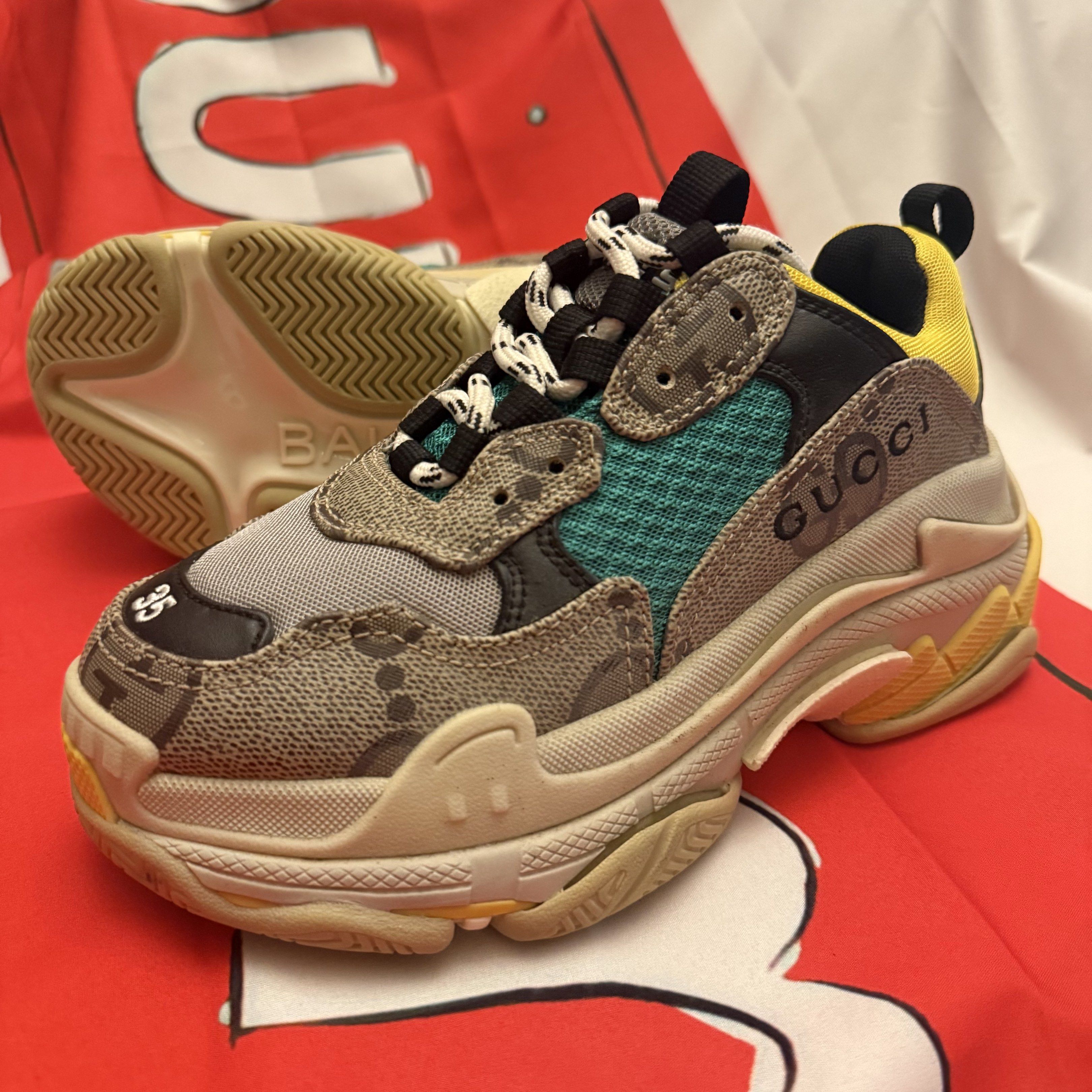 BB x GG Hacker Project Triple S Sneakers Size 35 (Category: Sneakers & Footwear) located in Paranaque City. Submitted by toastedmallows (Listing ID 1417589534, Image 1). Description: - Balenciaga Gucci Triple S sneakers - Size 35 - Multi-colored design - Features Gucci logo - Chunky sole - Lace-up closure Brandnew. No box. Ships via J&T MOP Gcash, Paymaya or BPI NO COD shoes may or may not have minimal dustmarks, these were display items from our