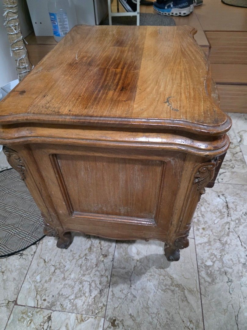 Bed Side Wooden Cabinet with Drawers (Category: Shelves, Cabinets & Racks) located in Mandaluyong City. Submitted by jhaysellshere (Listing ID 1417589144, Image 2). Description: European style bed side cabinet with two drawers. Features ornate carvings, brass handles, and a warm wood finish. Sturdy and well-crafted. Material is heavy.