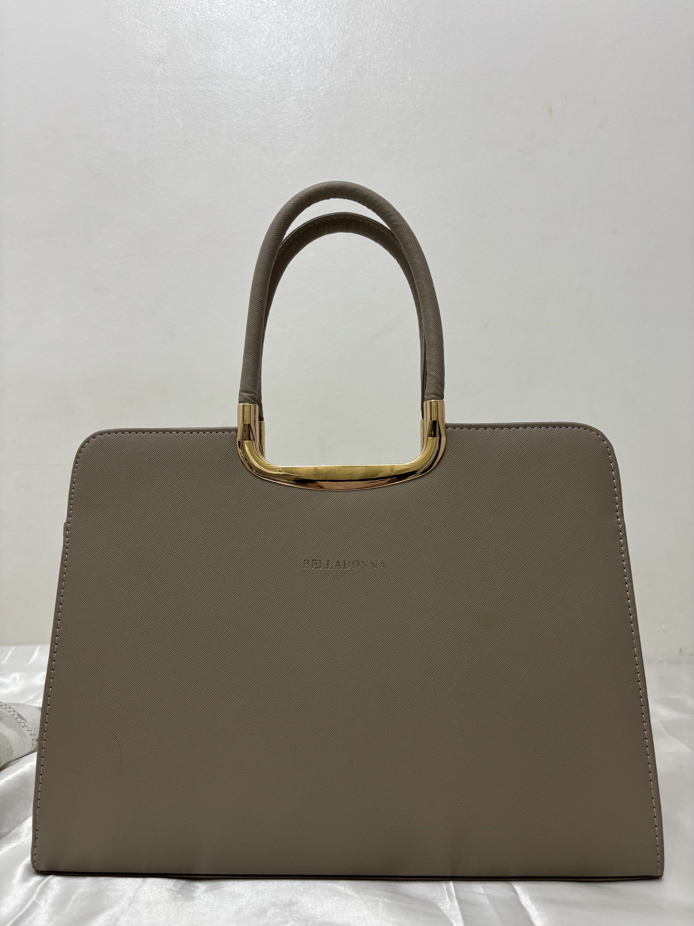 Bella Donna Handbag with Gold Handle (Category: Luxury Bags & Wallets) located in Manila. Submitted by zarrie_ (Listing ID 1417580119, Image 1). Description: Belladonna Bag Decluttering — rarely used but still good as new. see the pictures Suitable for school and office use.