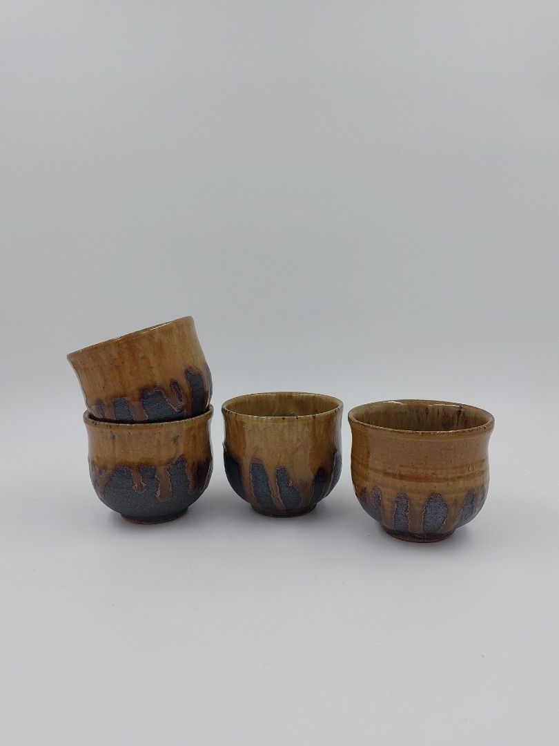 Stoneware Yunomi Set (Category: Coffee & Tea Tableware) located in Quezon City. Submitted by curated.stoneware.ph. (Listing ID 1417506778, Image 1). Description: - Set of ceramic cups - Unique brown and dark blue glaze - Rounded shape with a slightly flared rim - Perfect for tea or coffee - Great for your kitchen or dining collection - 3 x 2.5 inches Super nice in actual!😍.