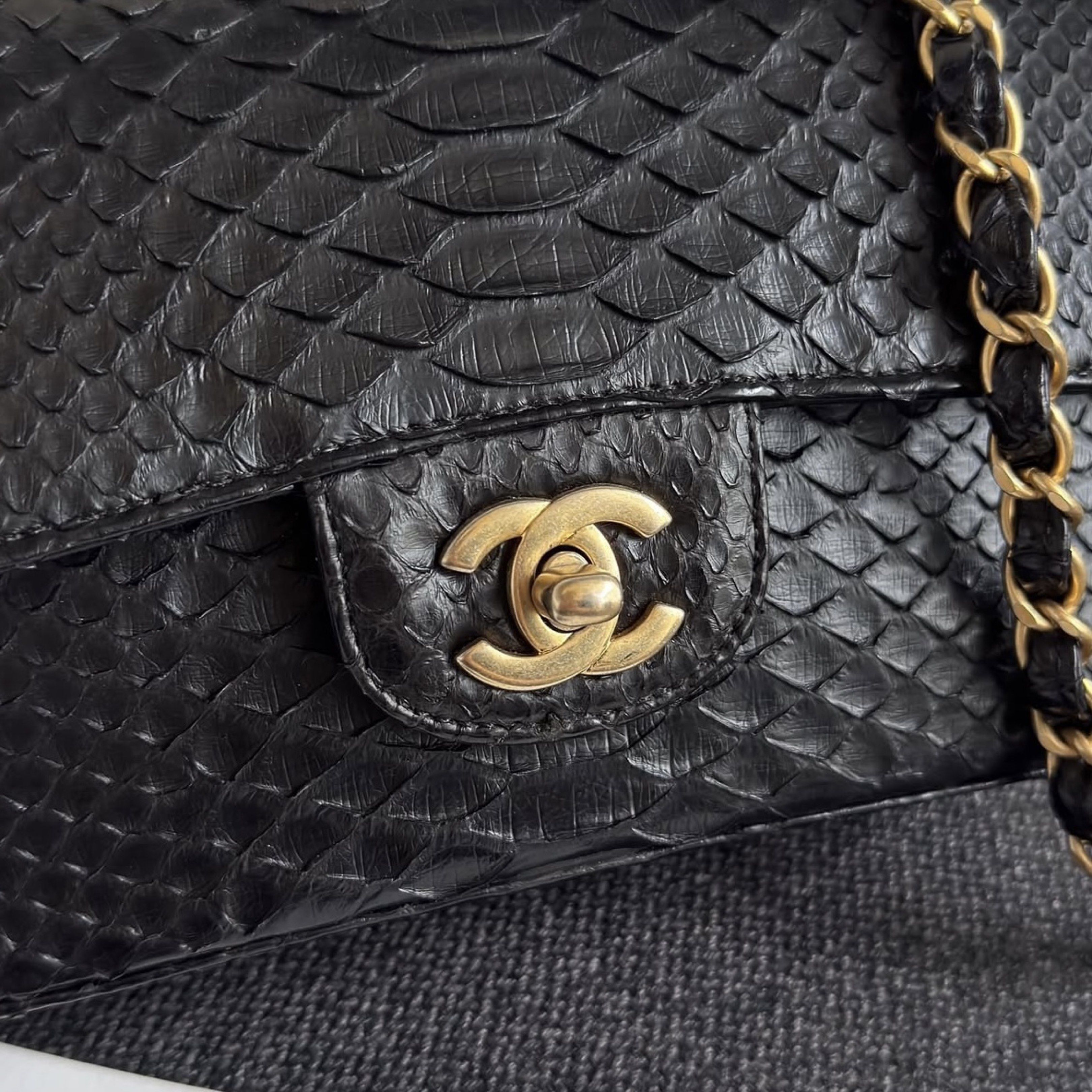 Chanel Mini Rectangular Flap Python Black Matte gold hardware (Category: Bags & Wallets) located in Singapore. Submitted by yasfinds (Listing ID 1417507353, Image 2). Description: Chanel Mini Rectangular Flap Like new L20 H12 D6cm Python Black Matte gold hardware Series 25 (year 2018) Comes with Authenticity card, box and dust bag only 2505# 📱App: Kai @ +65 98263475 ✔️Authenticity Guaranteed 📕Priority to Appointment(Walk-in subject to availabil