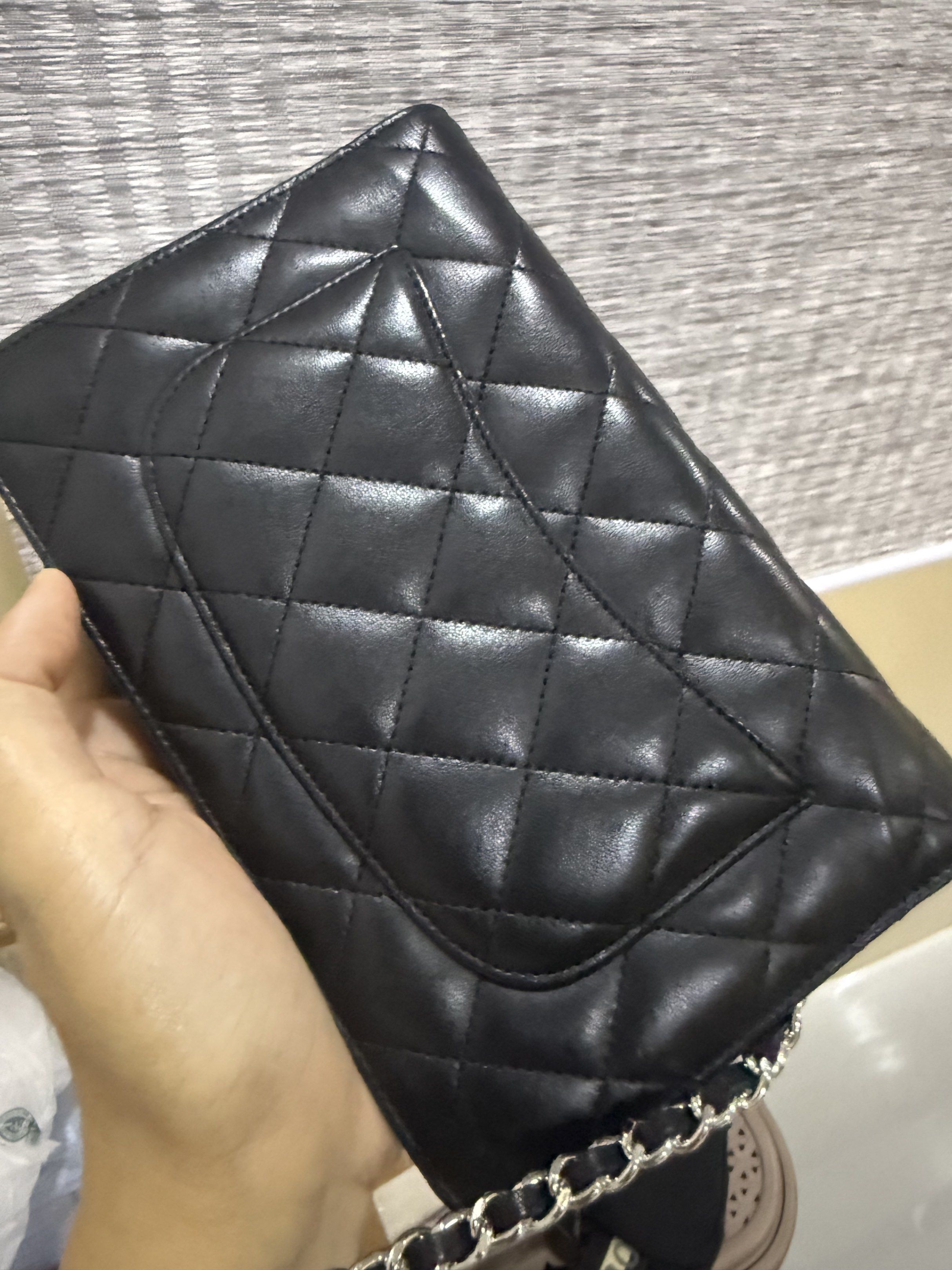 Chanel Wallet on Chain Black (Category: Luxury Bags & Wallets) located in Taguig. Submitted by bianca625 (Listing ID 1417570280, Image 3). Description: - Authentic Chanel Wallet on Chain - Black quilted lambskin leather - Chain strap - Iconic CC logo - Flap closure - Multiple interior compartments - Includes zippered pocket and card slots - Made in France Silver hardware -series 18 with holo intact With dustbag and card.