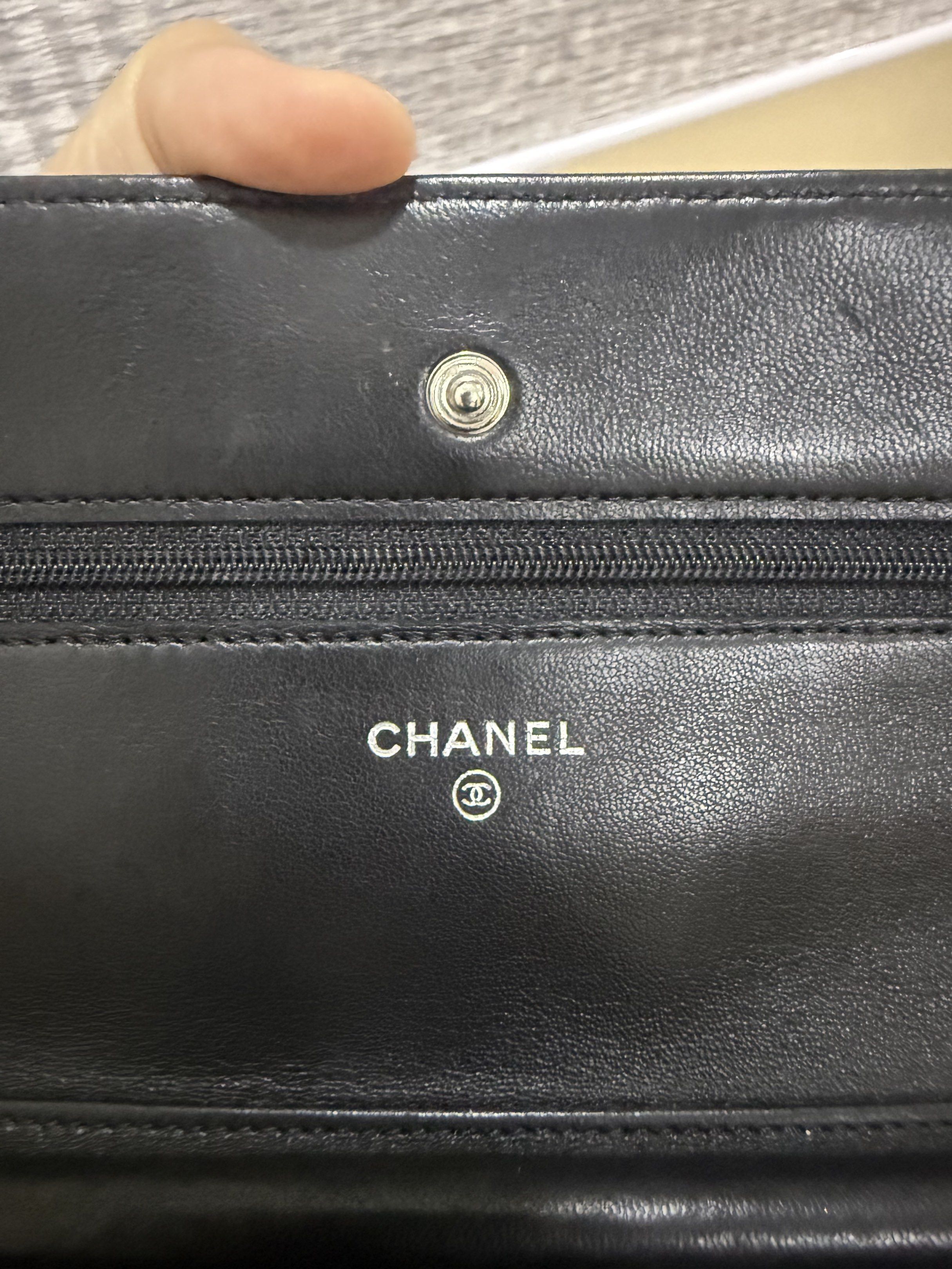Chanel Wallet on Chain Black (Category: Luxury Bags & Wallets) located in Taguig. Submitted by bianca625 (Listing ID 1417570280, Image 2). Description: - Authentic Chanel Wallet on Chain - Black quilted lambskin leather - Chain strap - Iconic CC logo - Flap closure - Multiple interior compartments - Includes zippered pocket and card slots - Made in France Silver hardware -series 18 with holo intact With dustbag and card.