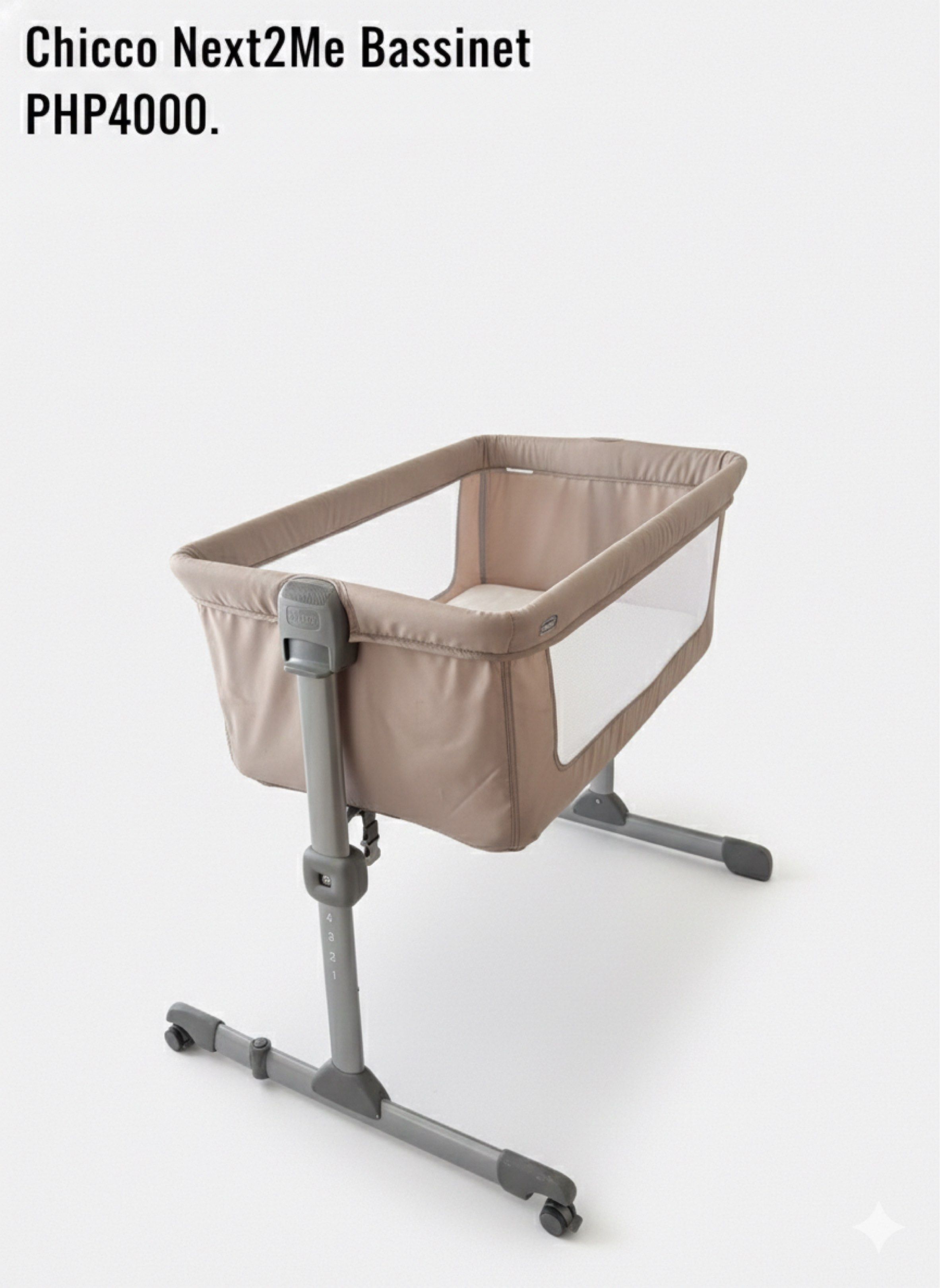Chicco Next2Me Bassinet (Category: Cots & Cribs) located in Mandaluyong City. Submitted by fidgetcracker (Listing ID 1417412317, Image 1). Description: - Chicco Next2Me Bassinet - Neutral color design - Mesh side for visibility - Adjustable height settings - Equipped with wheels for easy movement - Ideal for newborns and infants.