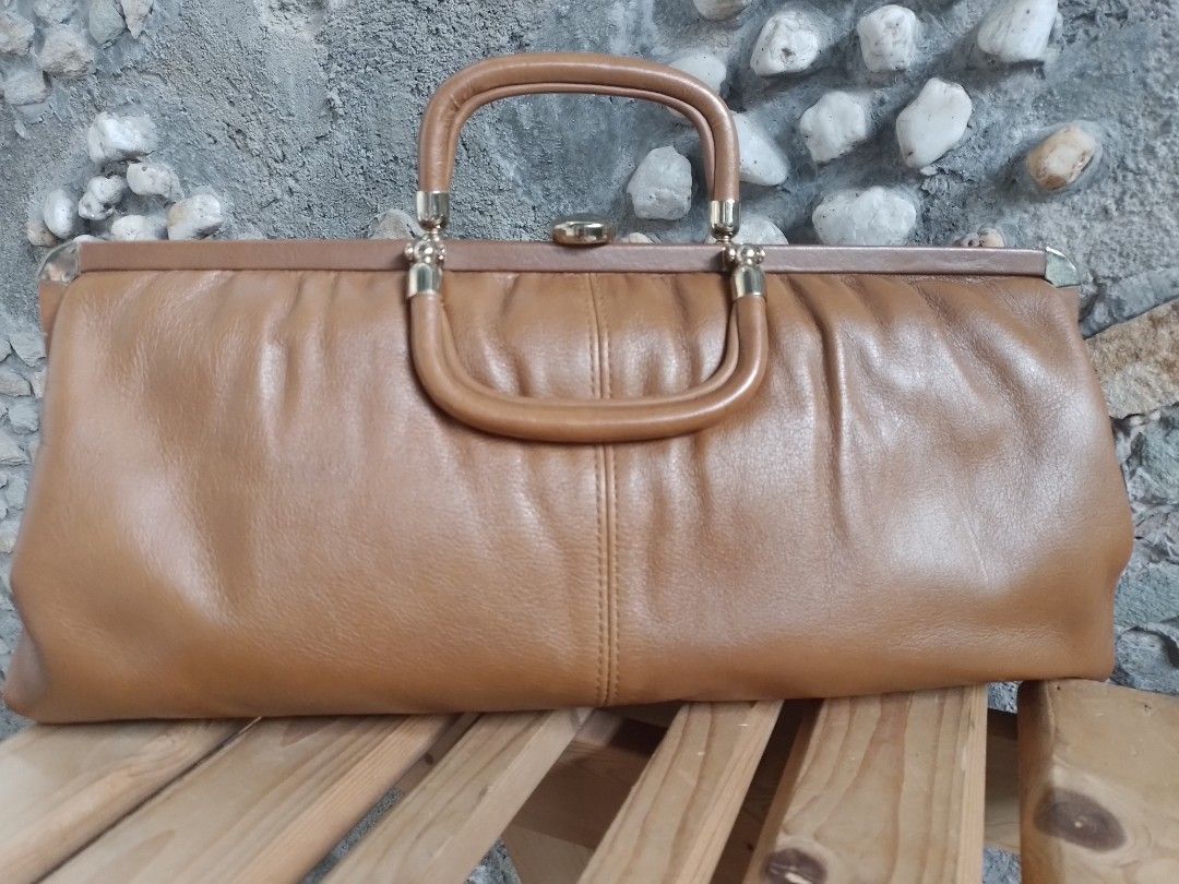 Clutches doctor style bag..leather (Category: Clutches) located in San Pedro. Submitted by thrifterside (Listing ID 1417405976, Image 2). Description: 13.5 L x 6.5 H leather bag..all intact good as new.. from japan " as is basis" but its a good buy for quality bag.