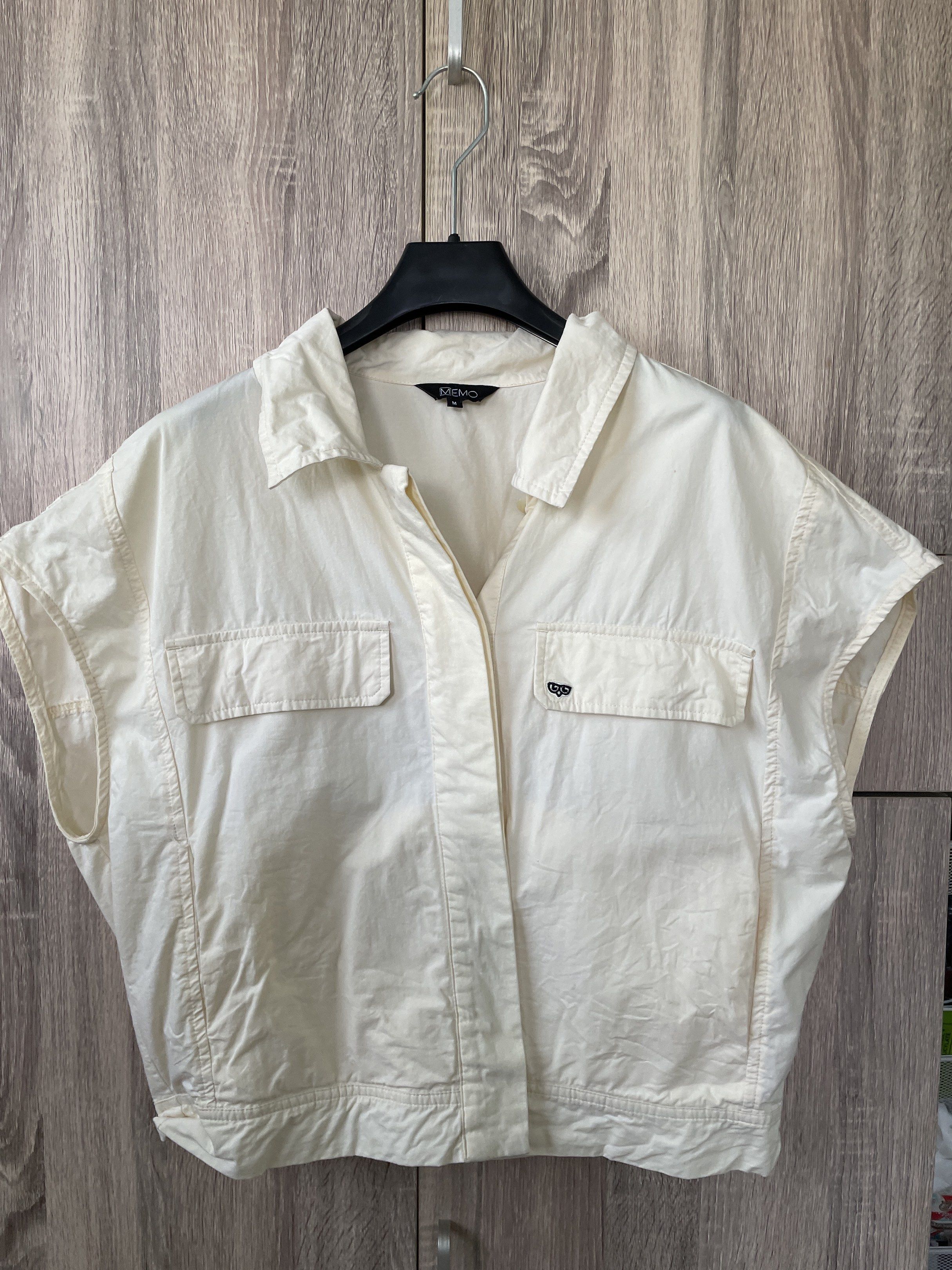 Cream-colored Sleeveless Top (Category: Shirts) located in Manila. Submitted by akingkingking (Listing ID 1417408987, Image 1). Description: - Cream-colored sleeveless top - Collared neckline - Two front pockets - Button-up closure - Relaxed fit - buyer to shoulder shipping fee, sta mesa manila area.