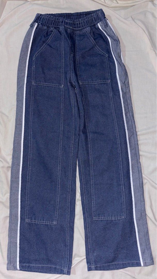 Denim Pants with Side Stripes - Size M (Category: Jeans) located in Manila. Submitted by rtzvxz (Listing ID 1417602923, Image 1). Description: Unisex Barely used and in good condition. Rfs: Too long on me, had to wear this with chunky boots and insoles on to make it work… No issues Actual color of the item is lighter compared to the picture of the model. MOD: Jnt/Lalamove MOP: Gcash - Stylish medium wash denim pants - Unique side stripe design - 