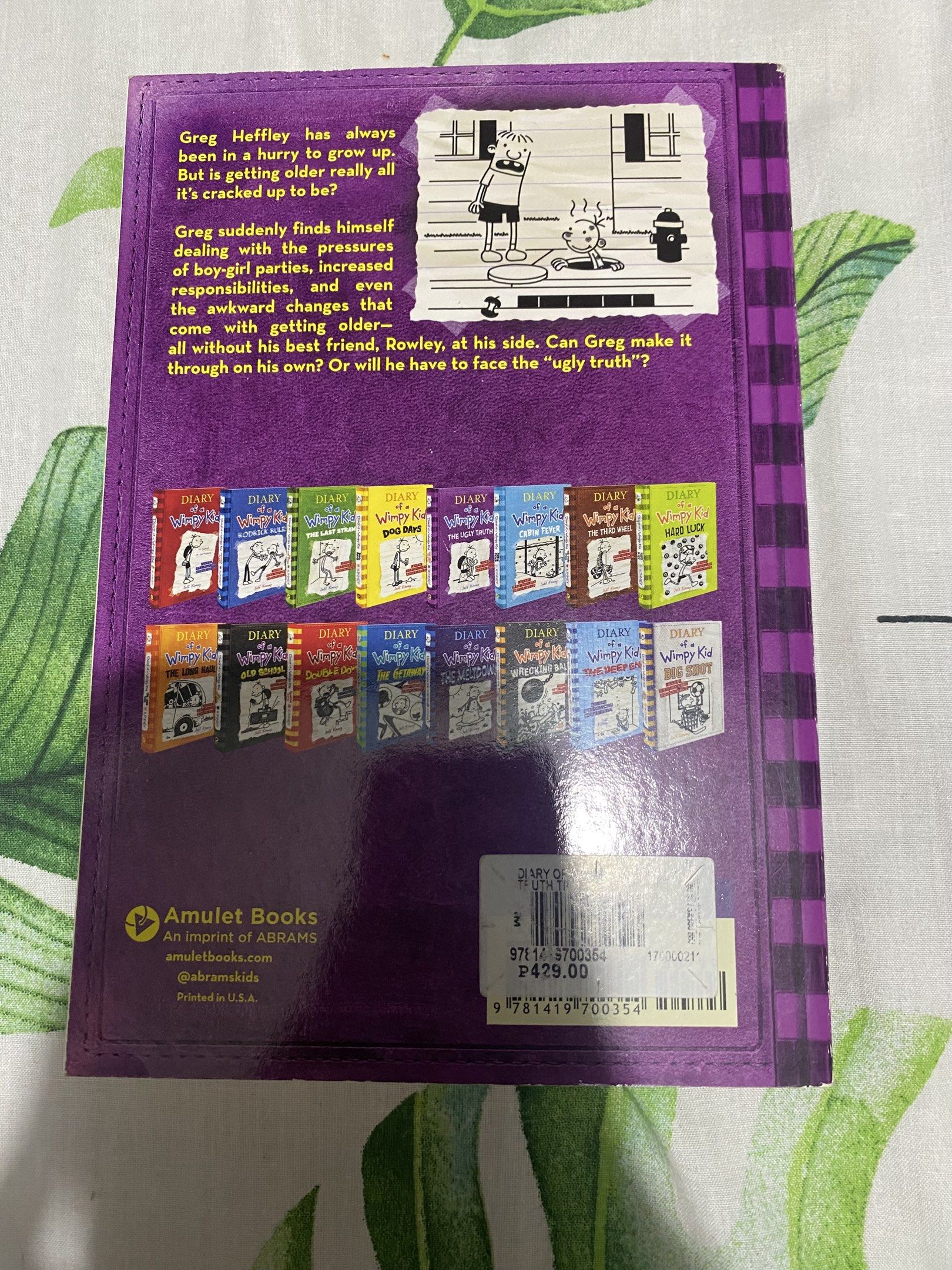 Diary of a Wimpy Kid Book 5 (Category: Children's Books) located in Manila. Submitted by stephora.pixel (Listing ID 1417546124, Image 2). Description: - Title: Diary of a Wimpy Kid: The Ugly Truth - Author: Jeff Kinney - Series: Diary of a Wimpy Kid - Publisher: Amulet Books - Features: Includes a list of other books in the series on the back. - Original Price: ₱429.