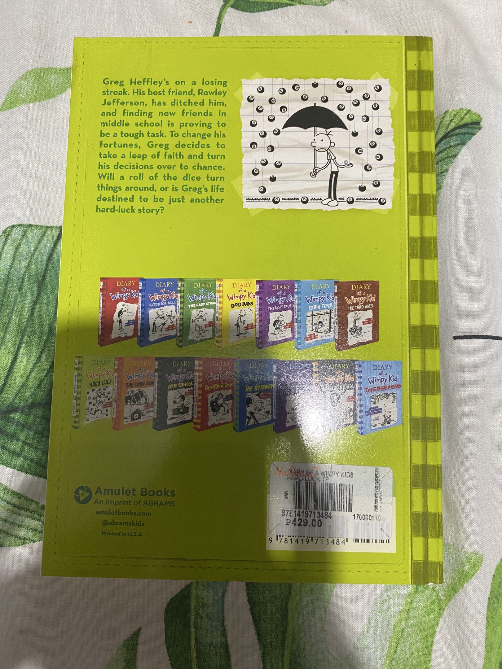 Diary of a Wimpy Kid Book 8 (Category: Children's Books) located in Manila. Submitted by stephora.pixel (Listing ID 1417546397, Image 2). Description: - Diary of a Wimpy Kid: Hard Luck book - By Jeff Kinney - Features Greg Heffley's story - Published by Amulet Books - Back cover lists other books in the series - Original price: ₱429.00.