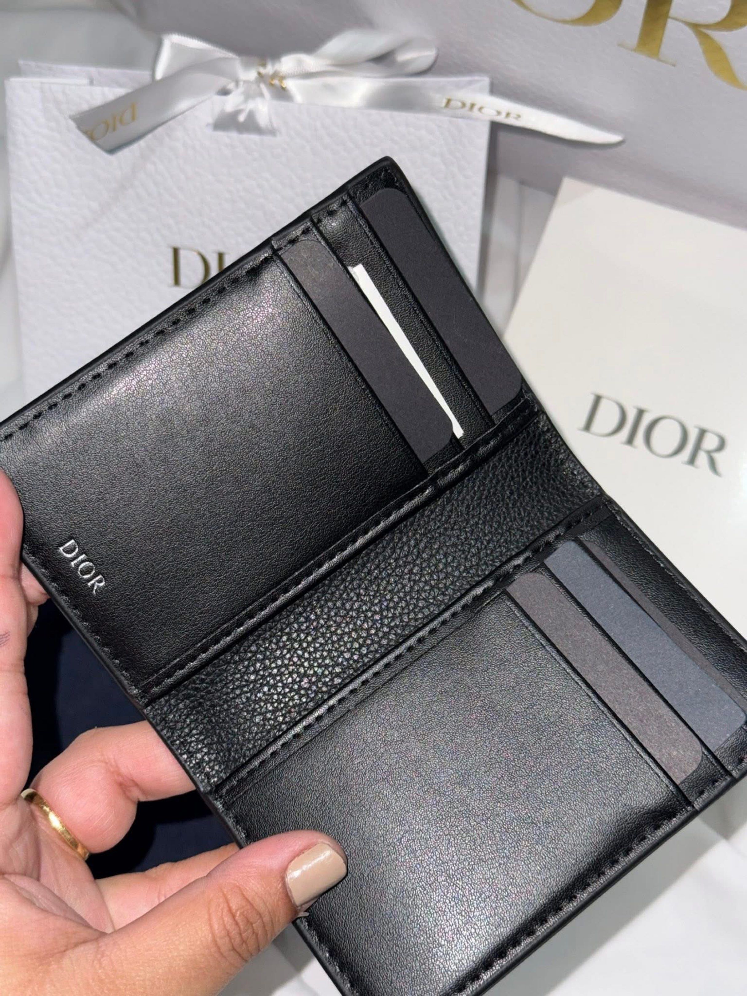 Dior Black Leather Card Holder (Category: Luxury Bags & Wallets) located in Imus. Submitted by diana2999 (Listing ID 1417580741, Image 2). Description: - Dior card holder - Black leather - Multiple card slots - Sleek design - Includes original box - Includes dust bag - Dior logo visible - Stylish and practical accessory.