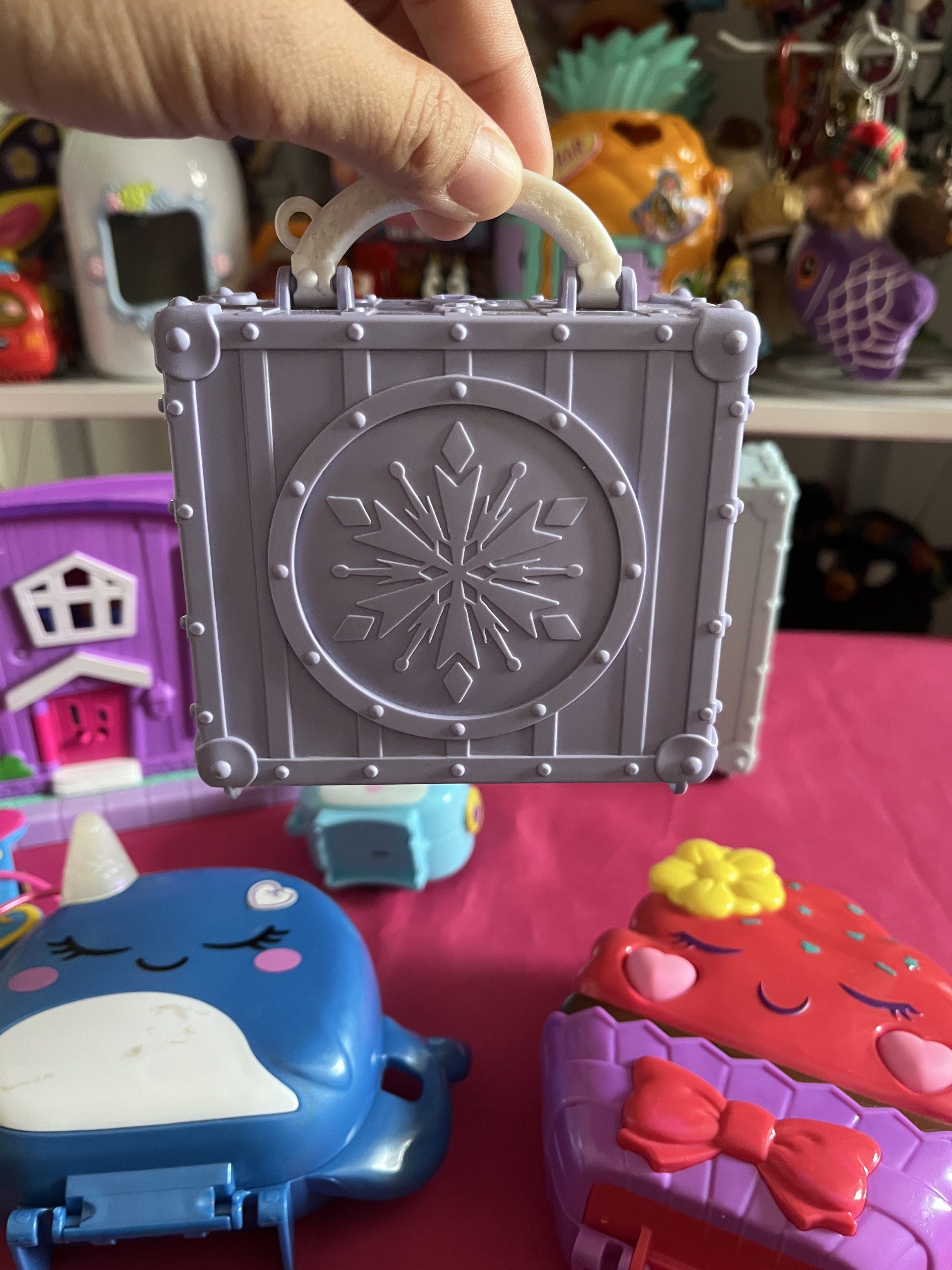 Disney Frozen Suitcase Playset (Category: Kids Toys) located in Calamba. Submitted by thepinkpicksee (Listing ID 1417484351, Image 1). Description: - Disney Frozen playset - Features a suitcase design with snowflake emblem - Includes a bedroom scene: bed, vanity, and framed picture - Miniature toy for imaginative play - Suitcase has a handle for easy carrying.