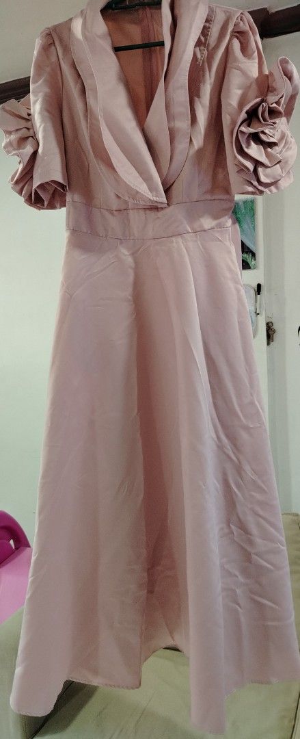 Dusty Rose Formal Dress (Category: Dresses) located in Rizal. Submitted by zhellieme (Listing ID 1417469170, Image 1). Description: -Used only once - Elegant dusty rose formal dress - Features a flattering V-neckline - Unique ruffled sleeves - Fitted bodice - Flowing skirt - Shirred waist with tie detail at the back - Perfect for special occasions.