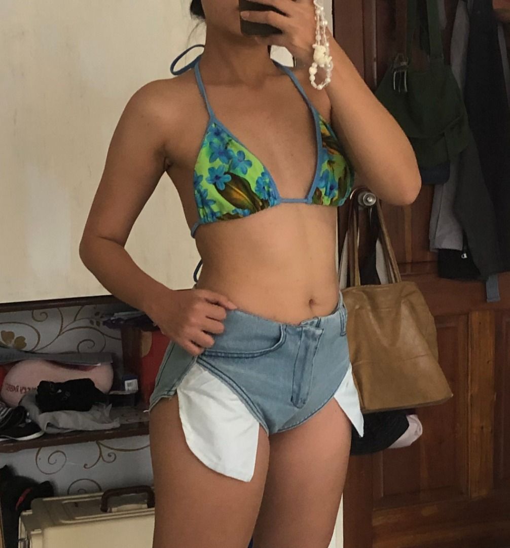 Floral Bikini Top (Category: Bikinis & Swimsuits) located in San Roque. Submitted by ibrakefordogs (Listing ID 1417499454, Image 2). Description: - Floral bikini top with vibrant floral pattern and blue accents - Adjustable straps .
