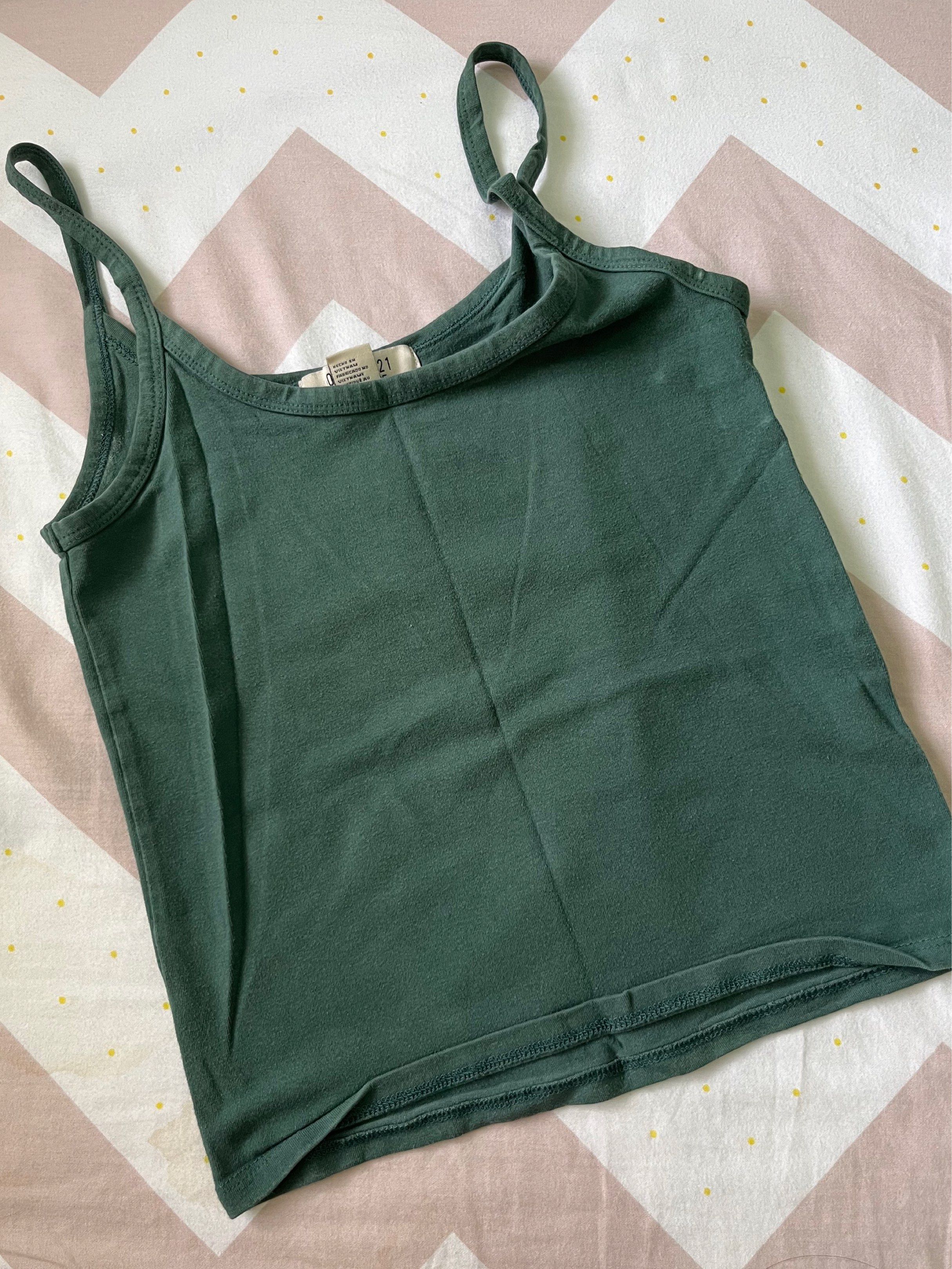 Forever 21 Green Tank Top - Size S (Category: Sleeveless) located in Quezon City. Submitted by goatedls (Listing ID 1417431190, Image 1). Description: - Forever 21 tank top - Size: Small - Color: Green - Style: Spaghetti strap - Material: Soft and comfortable.