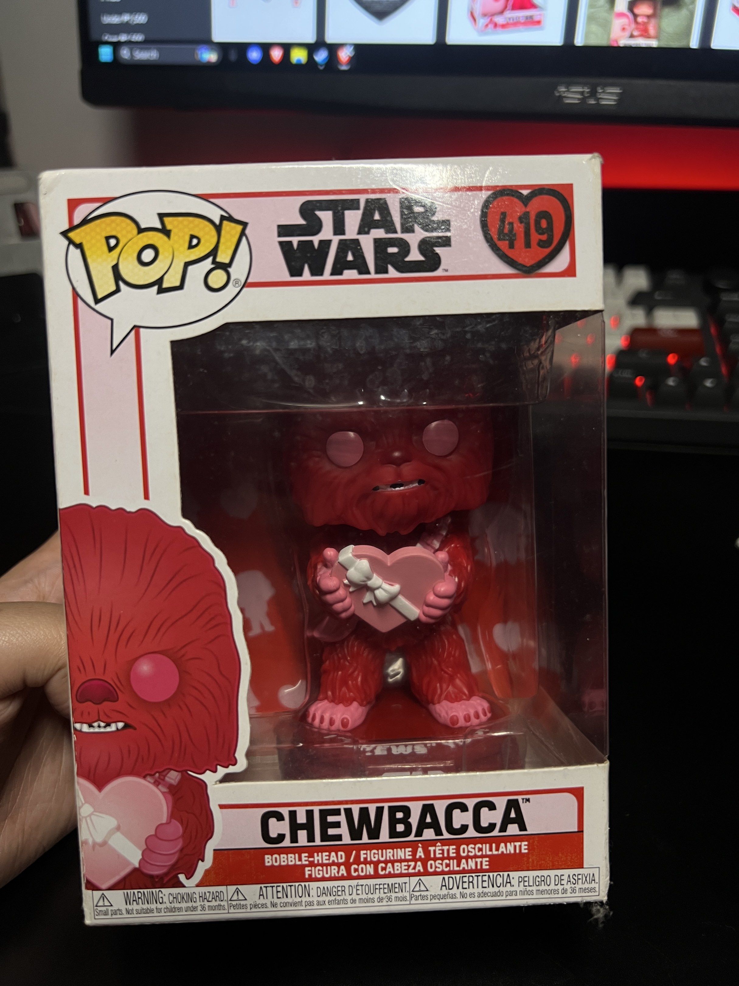 Funko Pop Star Wars Chewbacca Valentine's Day (Category: Figurines & Statues) located in Taguig. Submitted by _ZEROO (Listing ID 1417483849, Image 1). Description: - Funko Pop! Chewbacca figure. - Valentine's Day Edition. - Features Chewbacca holding a heart. - Number 419. - In original box. RFS: not really a star wars fan more in to Spidermans. it was a gift..