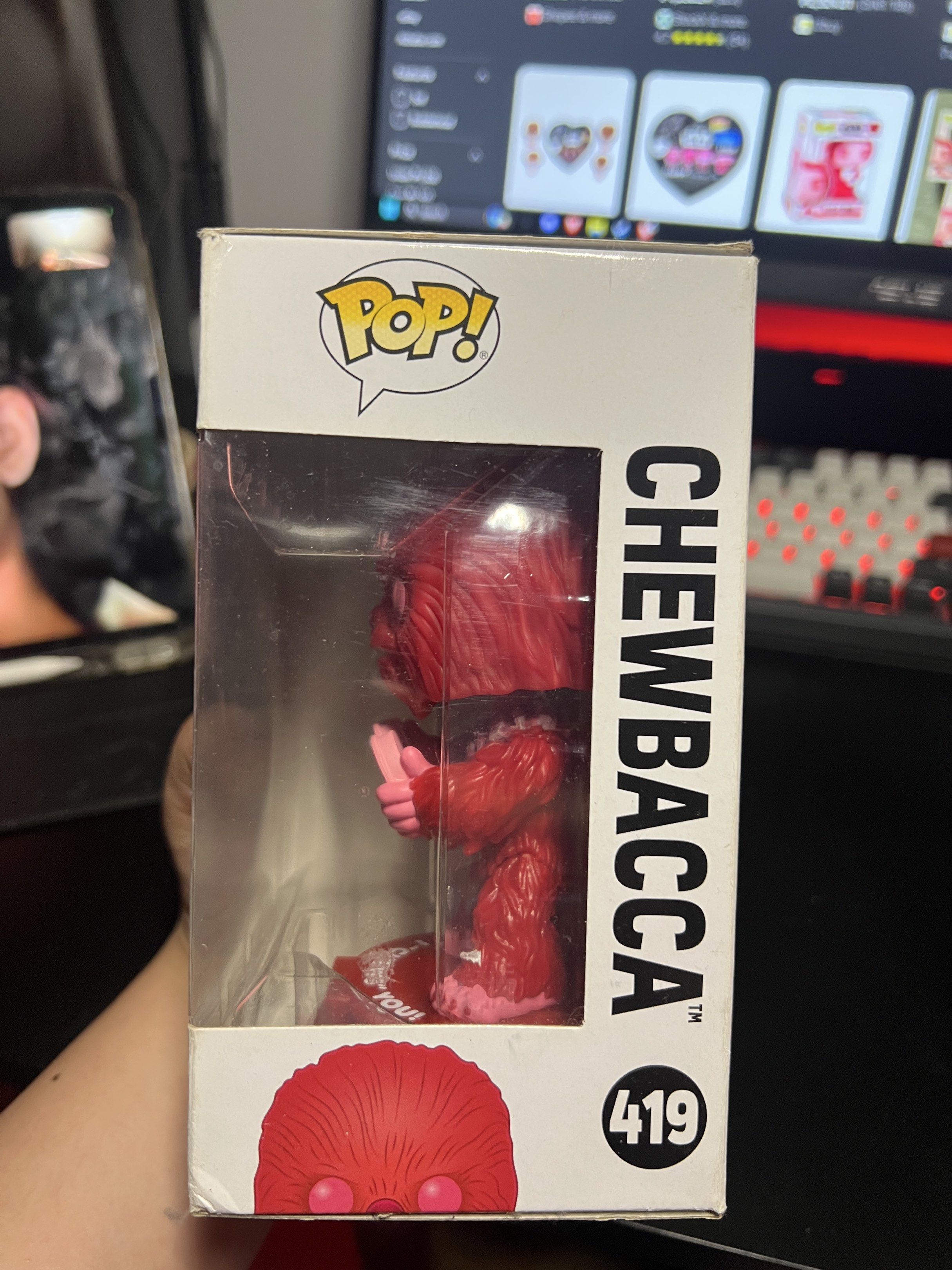 Funko Pop Star Wars Chewbacca Valentine's Day (Category: Figurines & Statues) located in Taguig. Submitted by _ZEROO (Listing ID 1417483849, Image 2). Description: - Funko Pop! Chewbacca figure. - Valentine's Day Edition. - Features Chewbacca holding a heart. - Number 419. - In original box. RFS: not really a star wars fan more in to Spidermans. it was a gift..